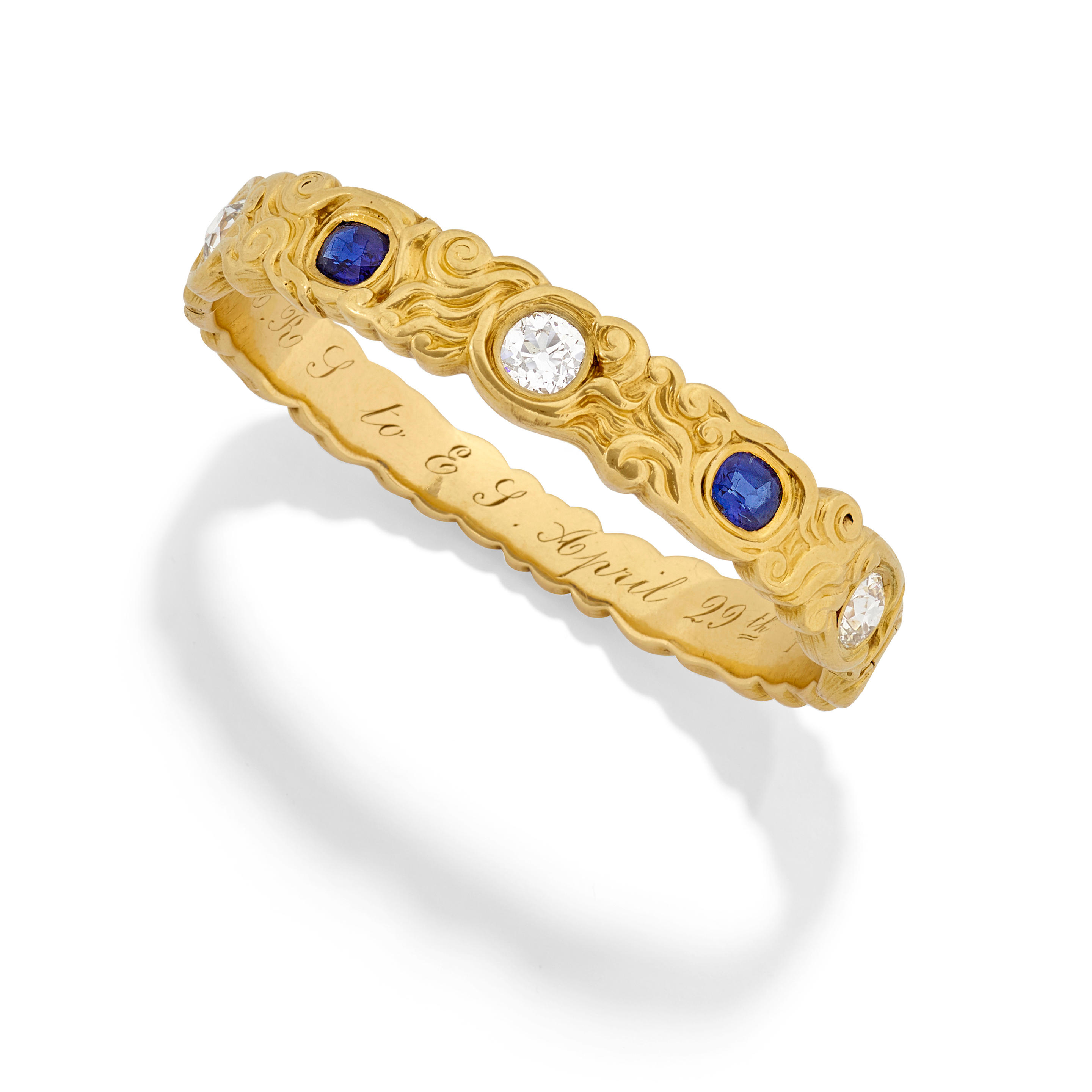 Appraisal: TIFFANY ART NOUVEAU GOLD SAPPHIRE AND DIAMOND HINGED BANGLE CIRCA