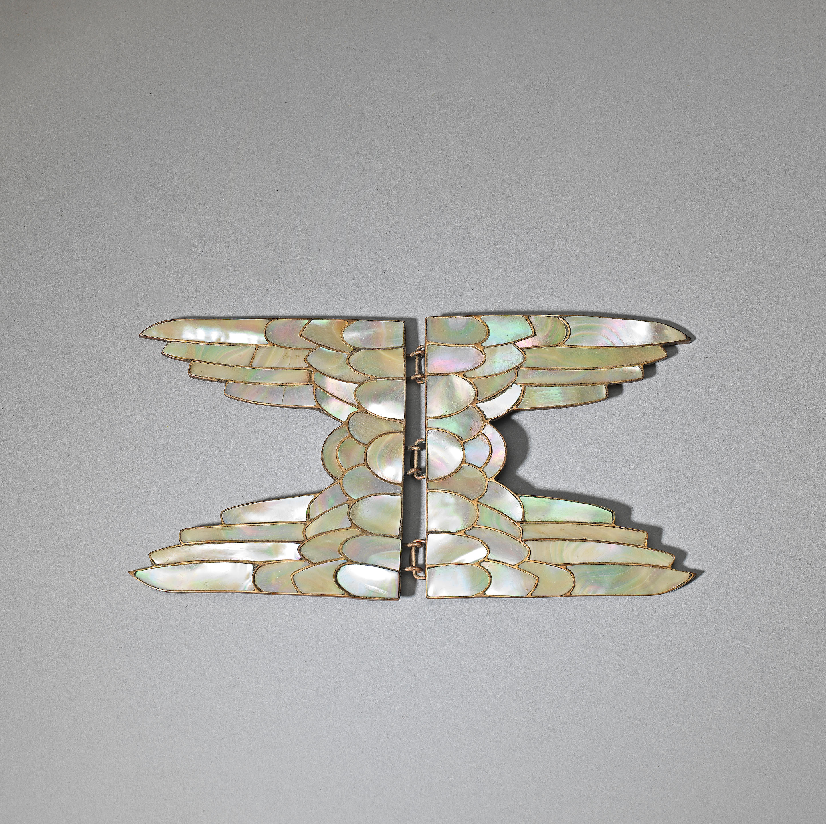 Appraisal: ARTS AND CRAFTS Cloak buckle circa Copper brass mother-of-pearl in