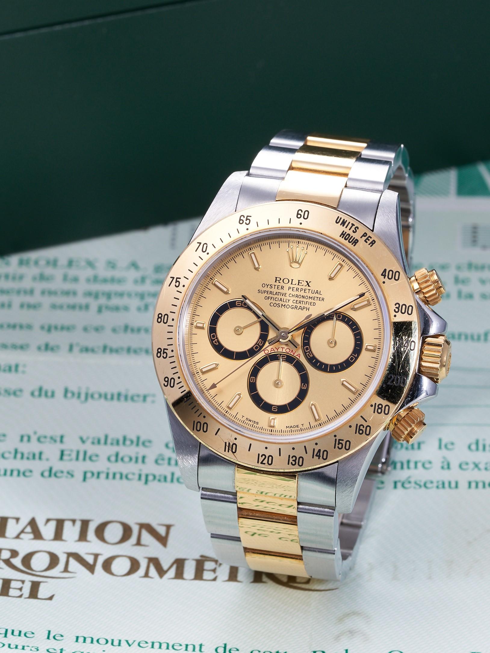 Appraisal: ROLEX DAYTONA REF A STAINLESS STEEL AND YELLOW GOLD CHRONOGRAPH