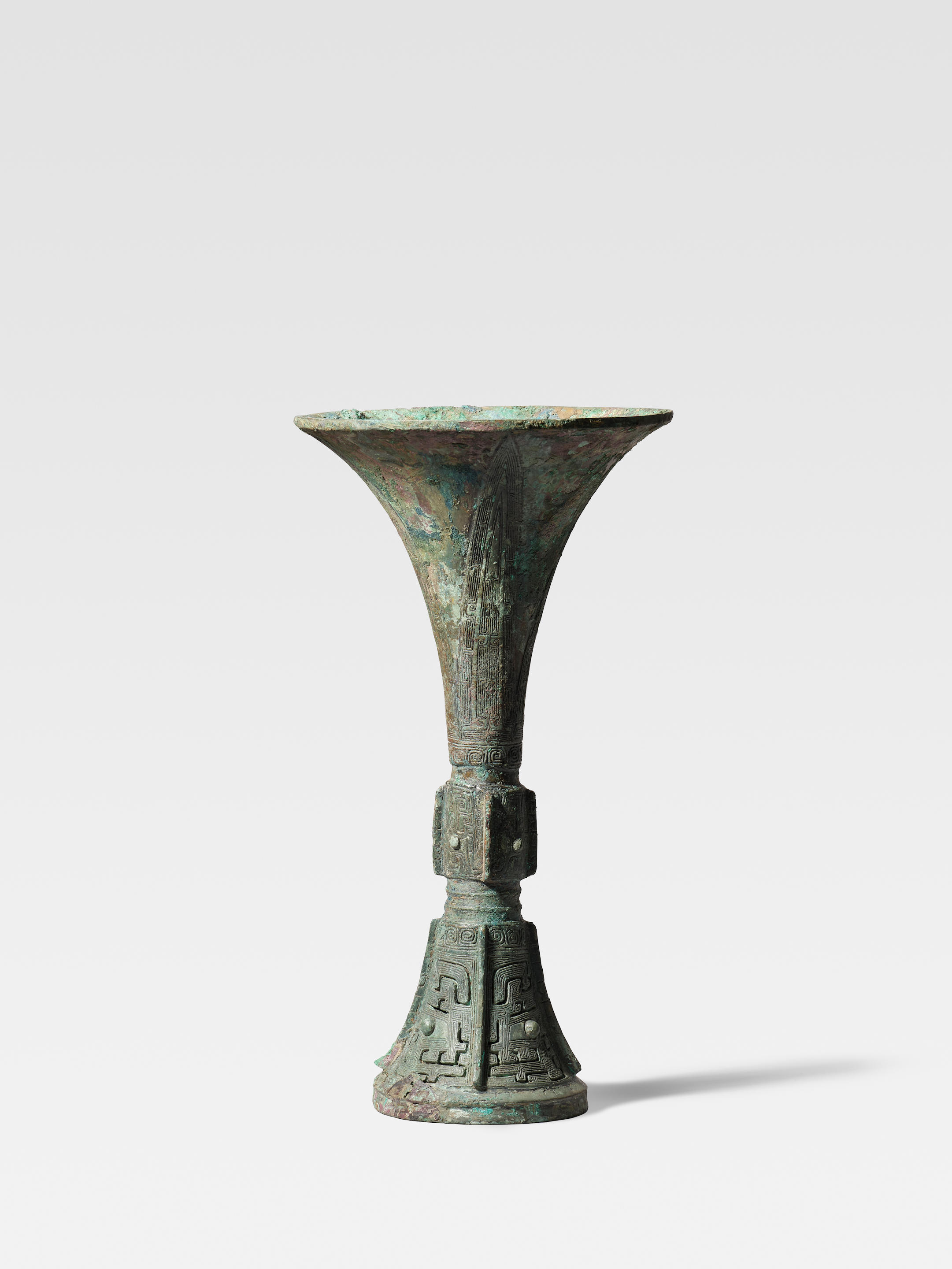 Appraisal: AN ARCHAIC BRONZE WINE VESSEL GU Late Shang Dynasty Of