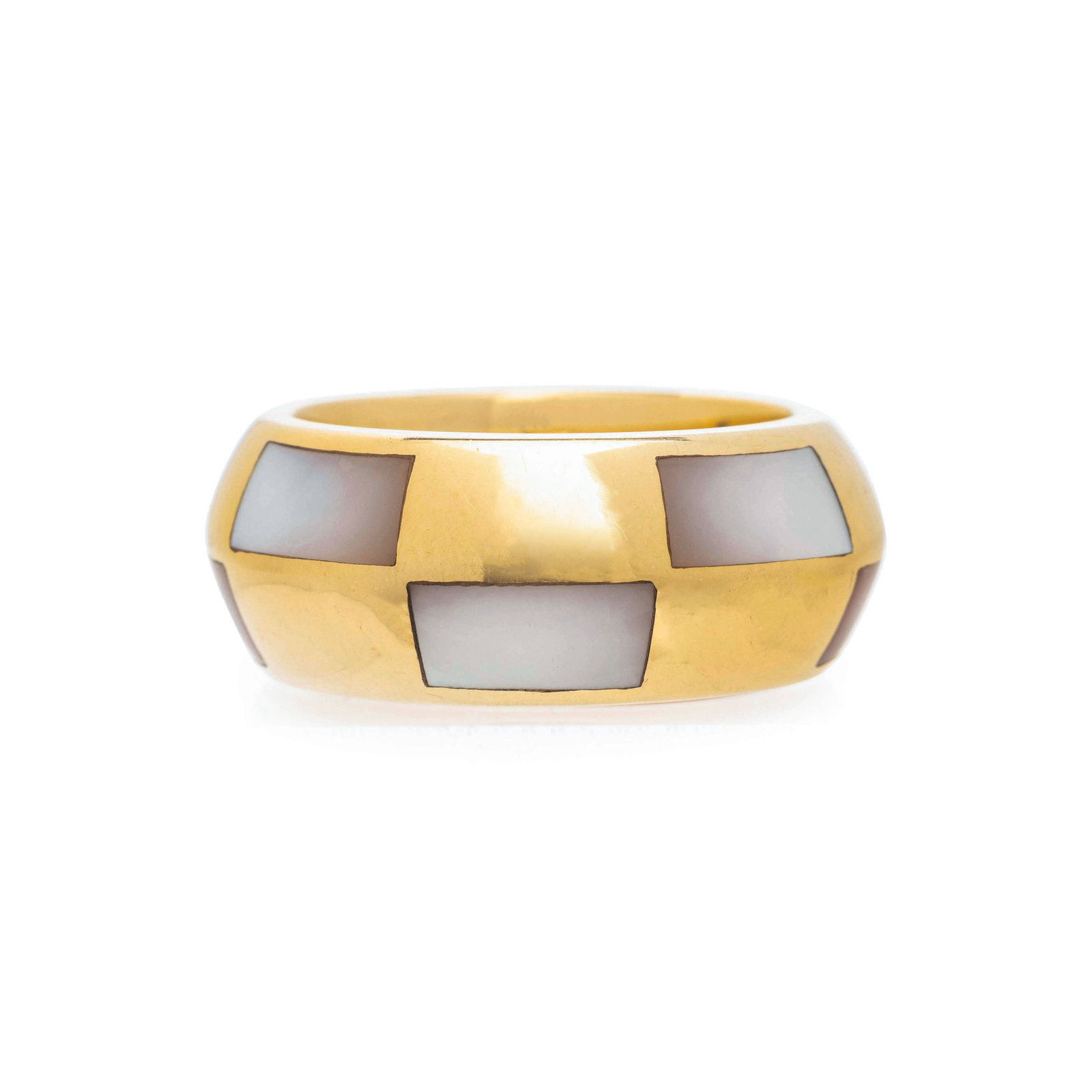 Appraisal: MAUBOUSSIN YELLOW GOLD AND MOTHER-OF-PEARL RING Mother-of-pearl inlay across the