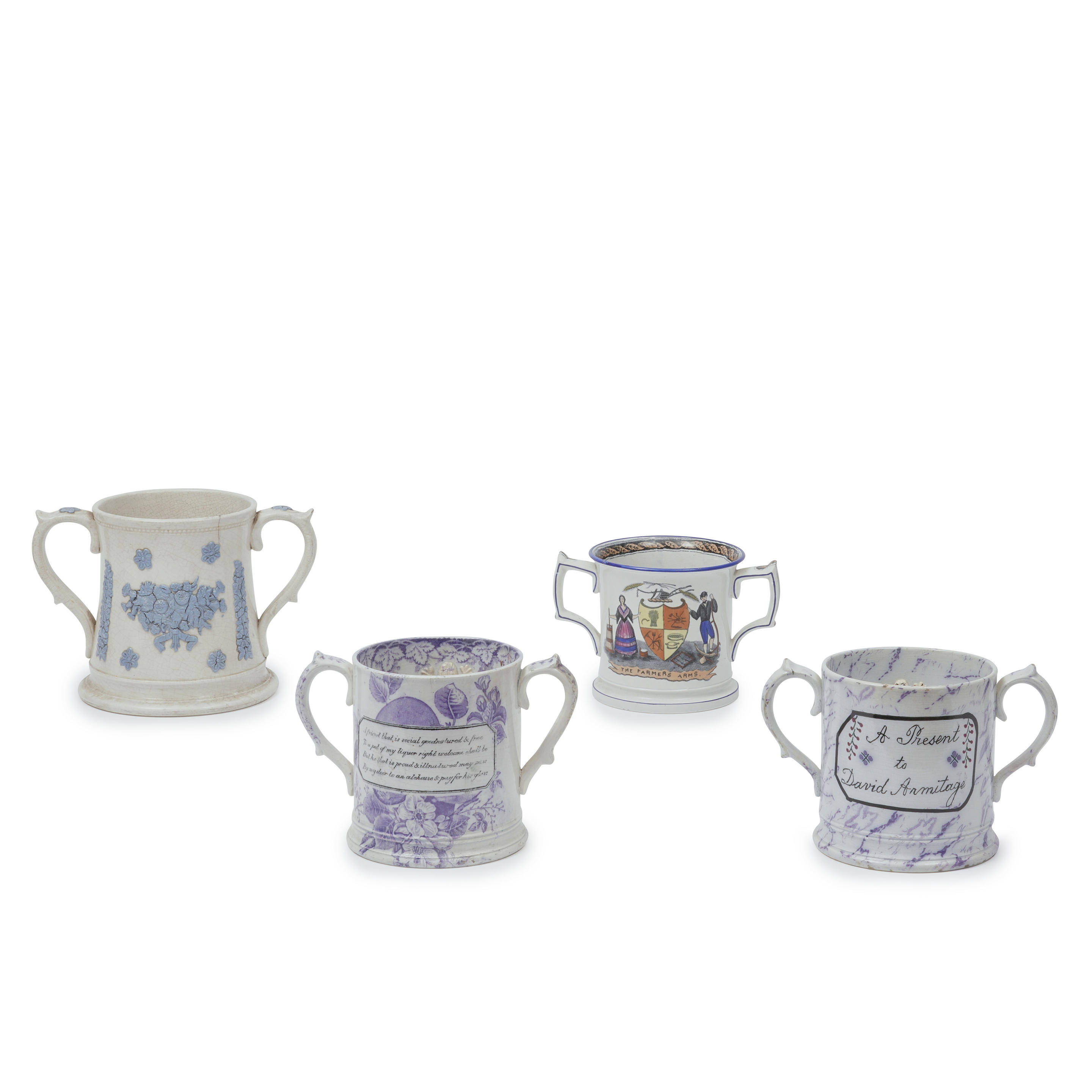 Appraisal: FOUR STAFFORDSHIRE POTTERY FROG MUGS LOVING CUPS including a mug