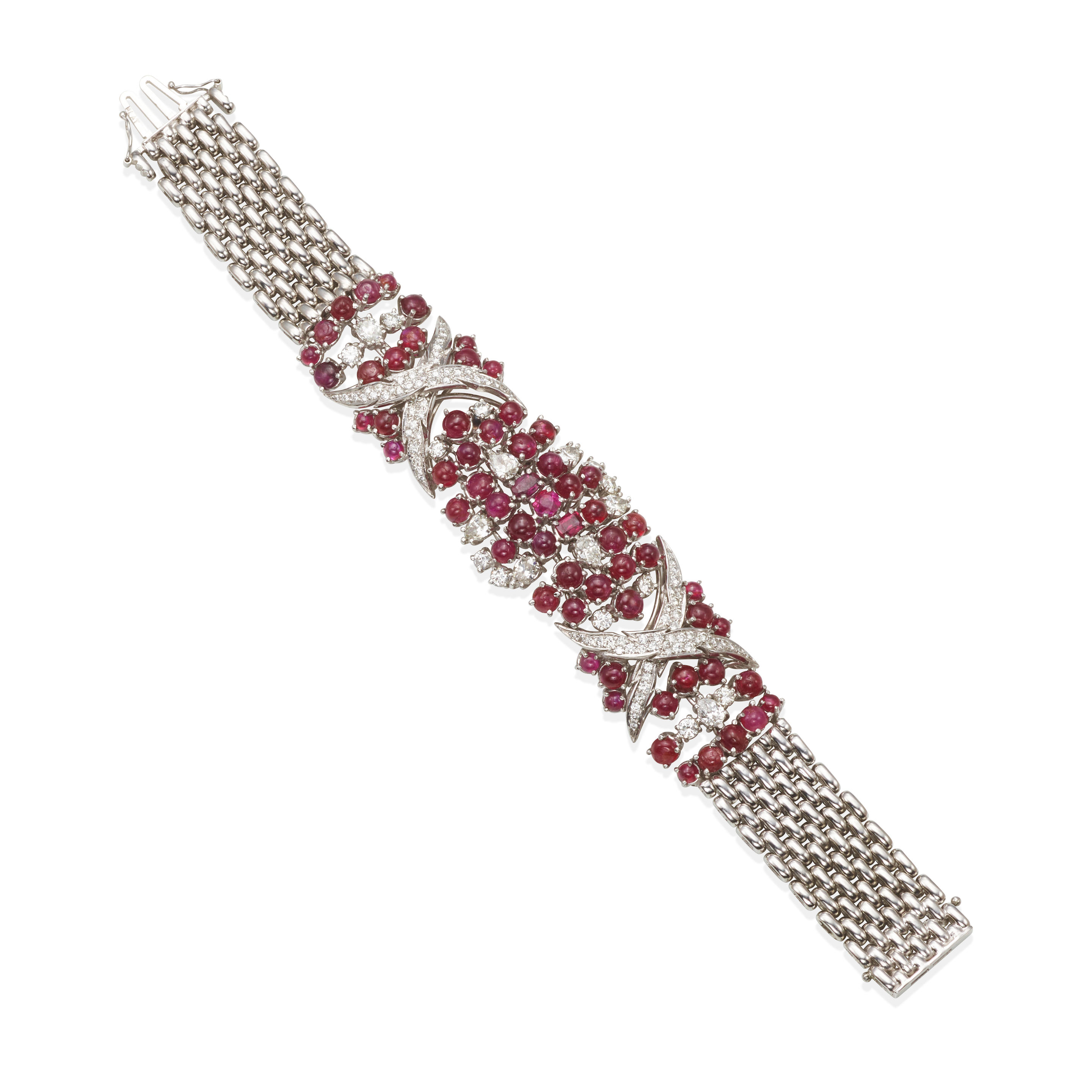 Appraisal: A PLATINUM RUBY AND DIAMOND BRACELET Centering single oval round