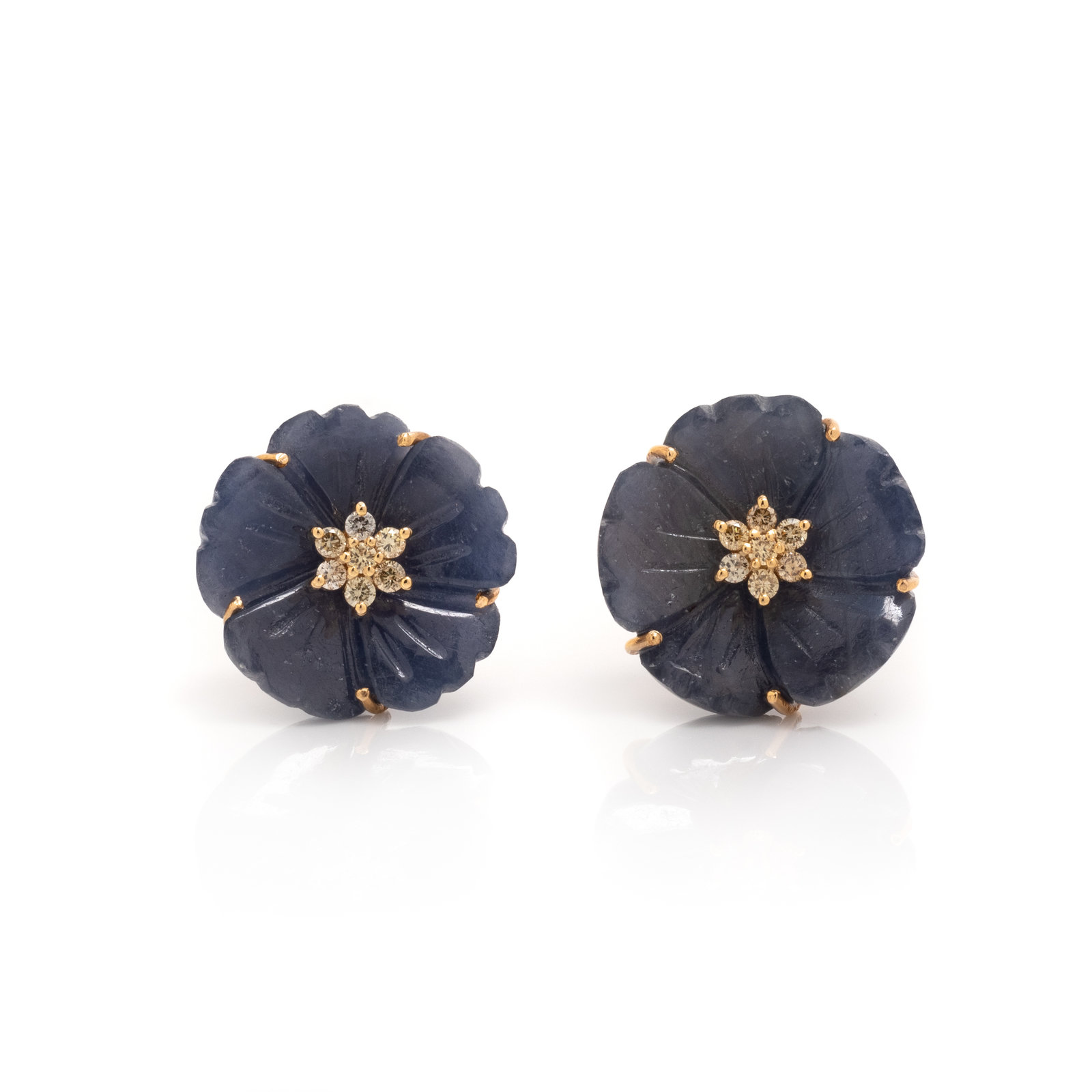 Appraisal: CARVED SAPPHIRE AND DIAMOND FLOWER EARRINGS Containing two carved flower