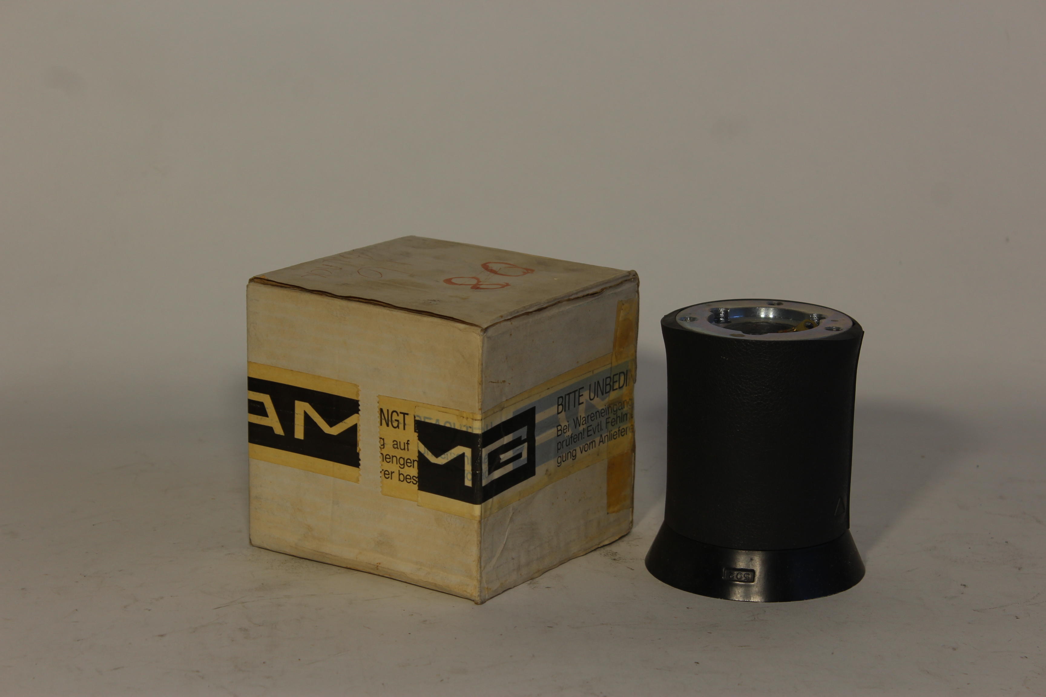 Appraisal: A NOS ATIWE FOR AMG MM STEERING WHEEL HUB IN