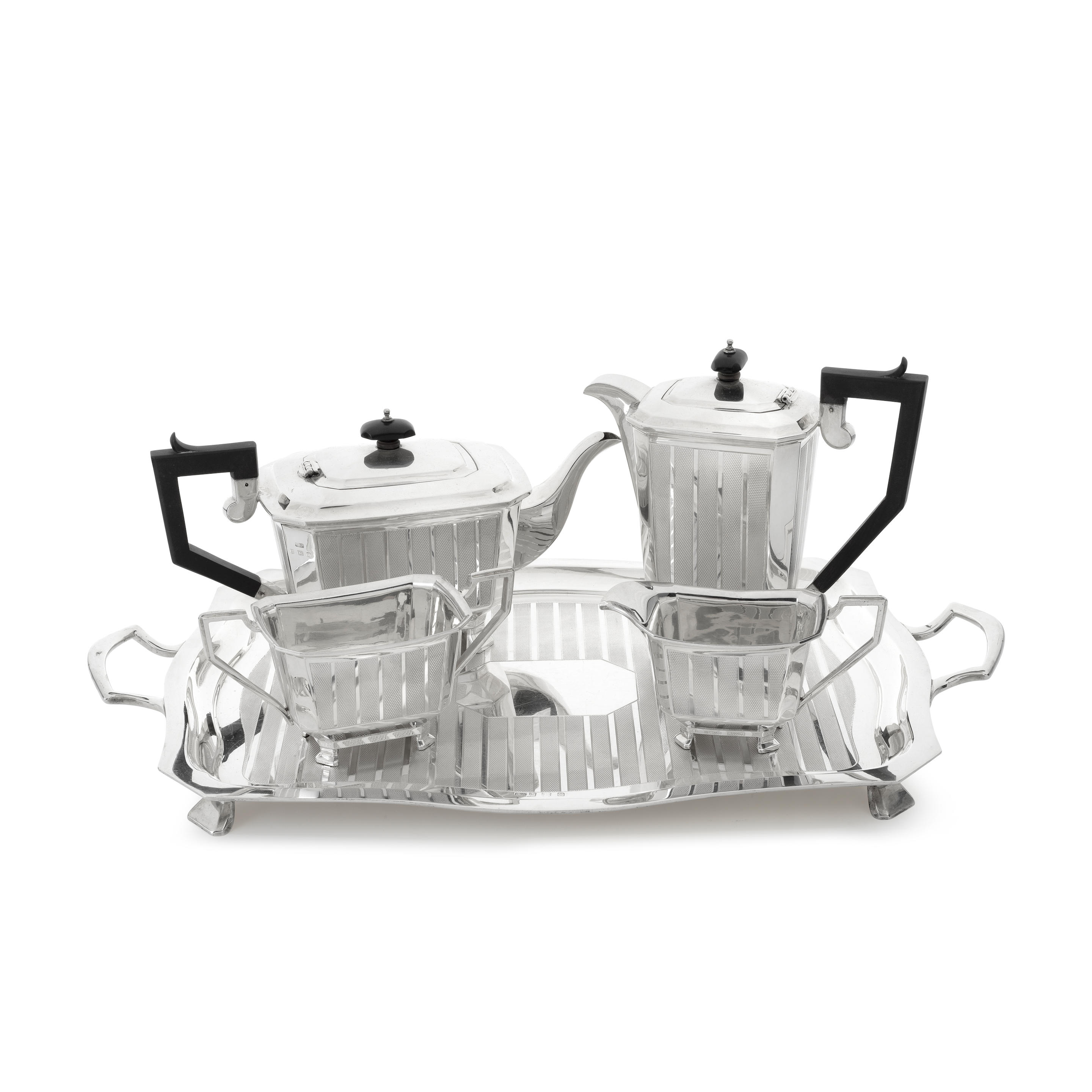 Appraisal: AN UNUSUAL ART DECO SILVER FIVE-PIECE TEA AND COFFEE SERVICE