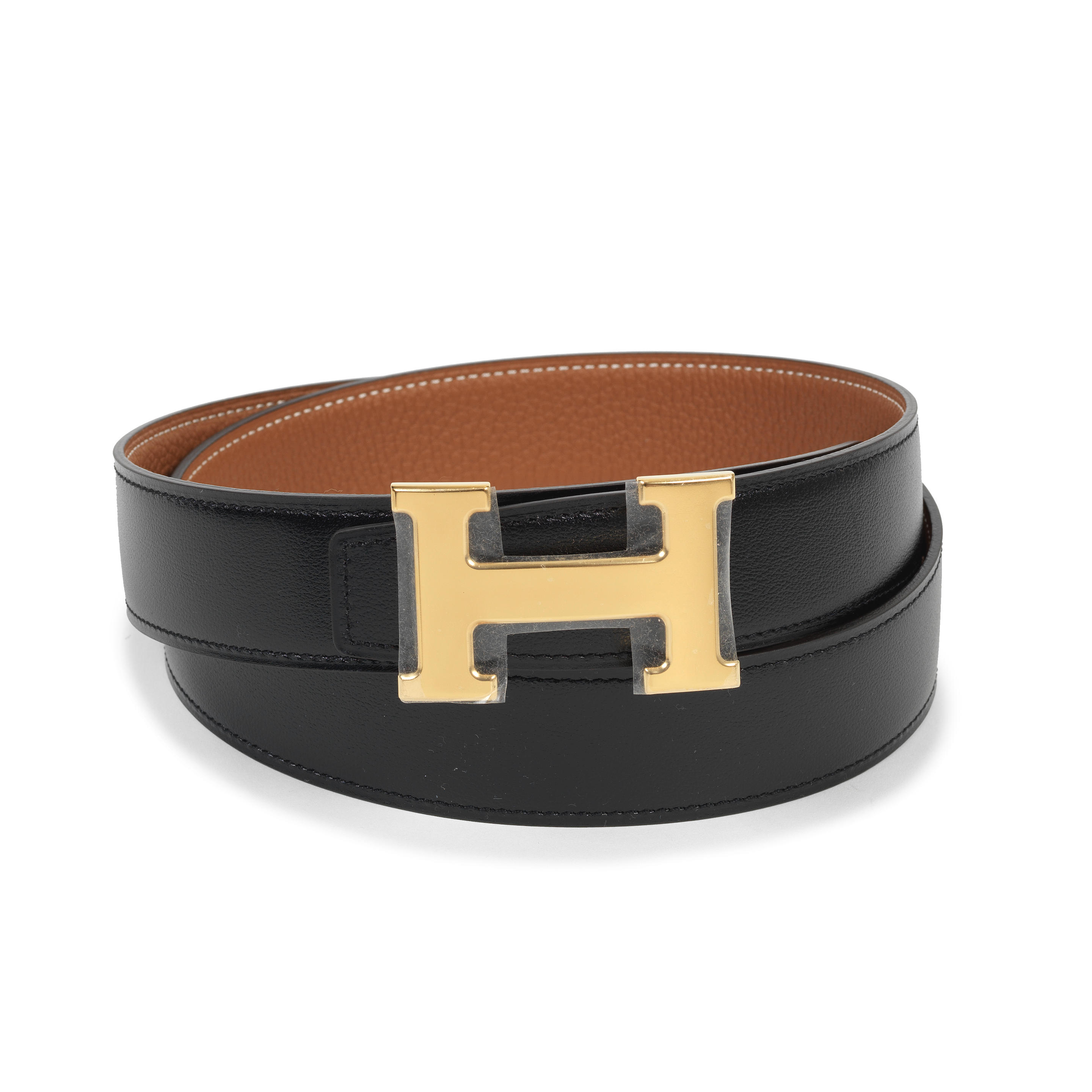 Appraisal: HERM S A BLACK AND GOLD REVERSIBLE CONSTANCE H BUCKLE