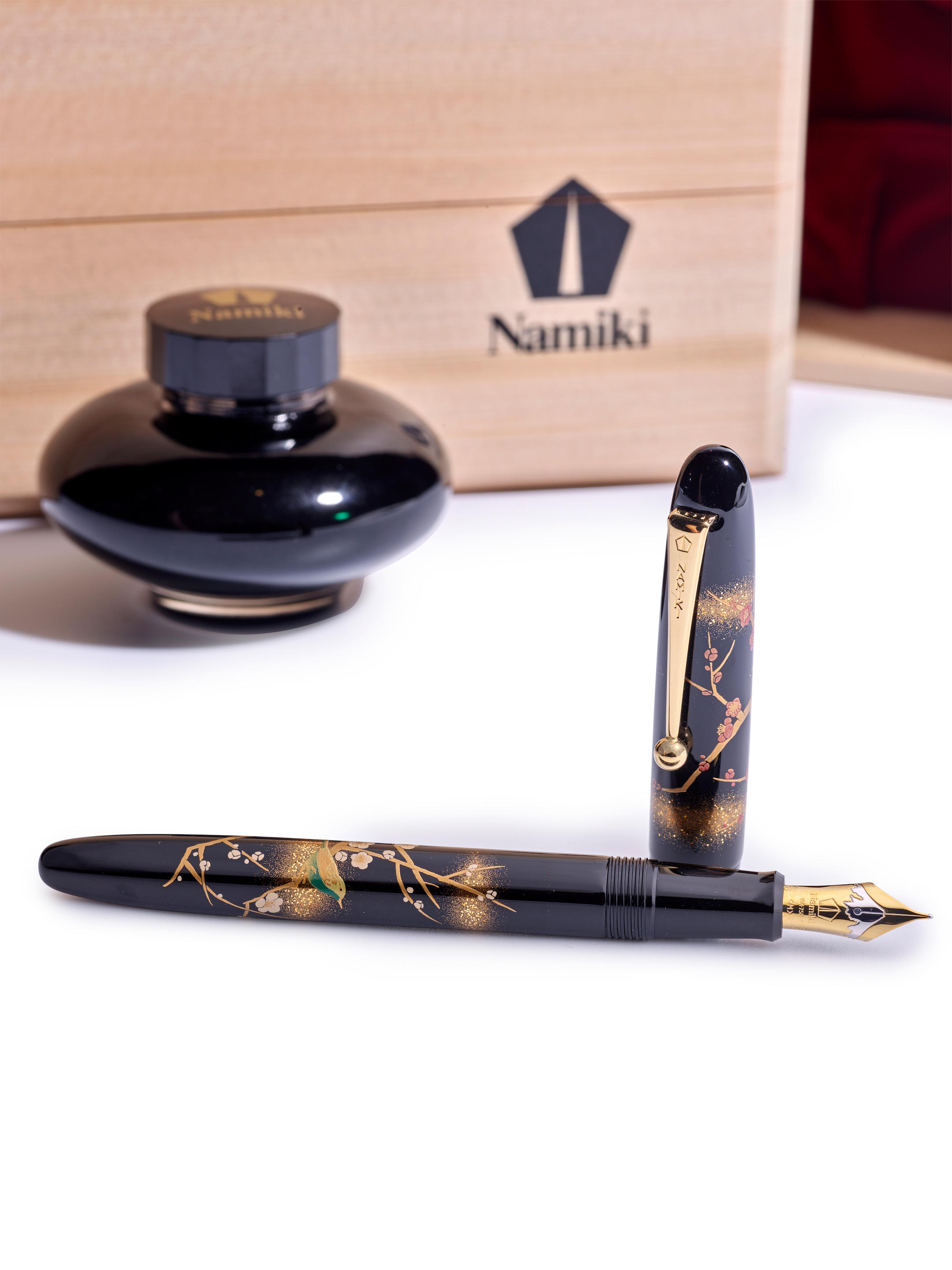 Appraisal: NAMIKI YUKARI - APRICOT TREE AND WARBLER A FINE URUSHI