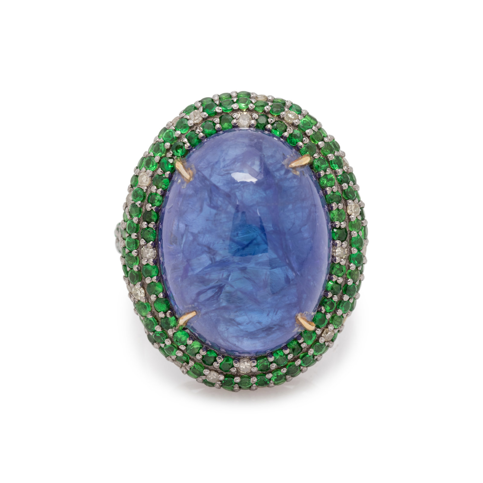 Appraisal: TANZANITE TSAVORITE GARNET AND DIAMOND RING Containing one oval cabochon