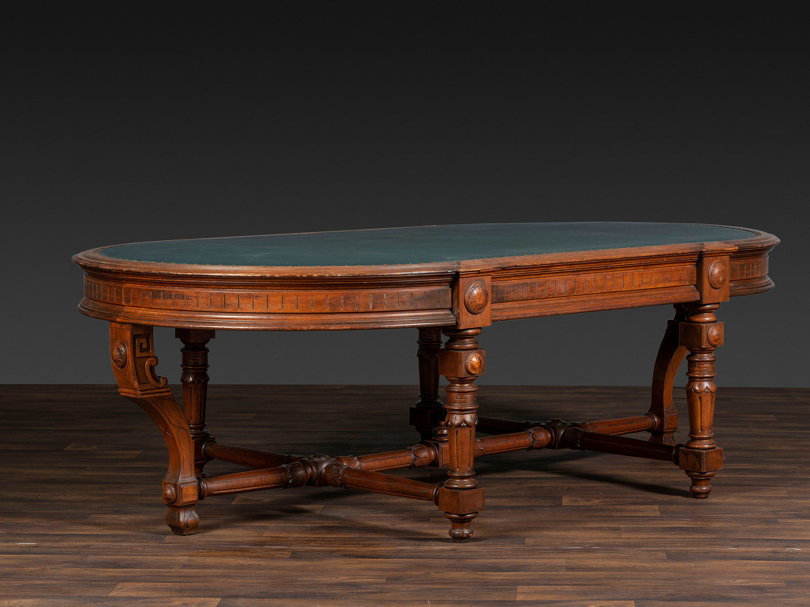 Appraisal: An Aesthetic Movement Leather Inset Carved Walnut Board Table th