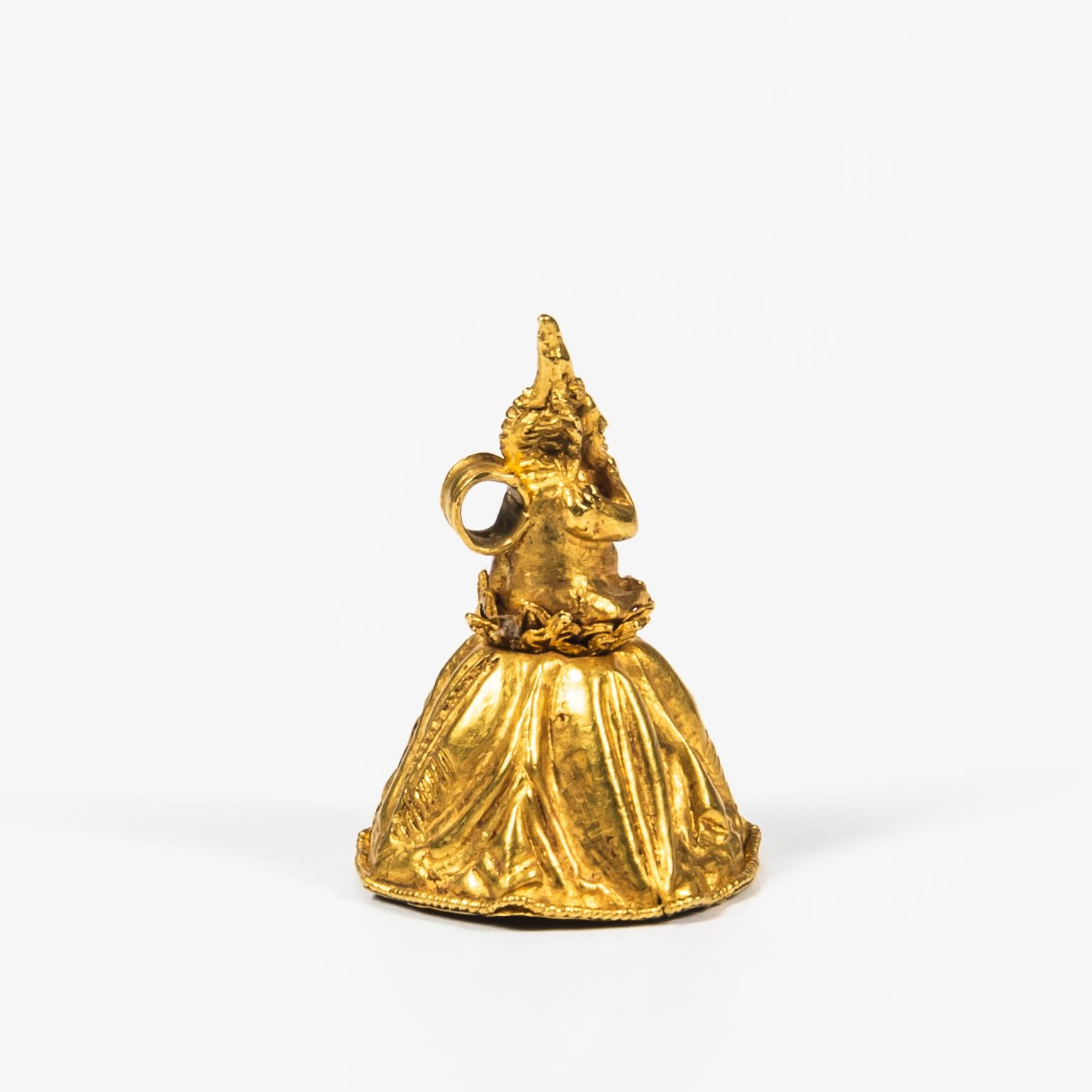 Appraisal: HIGH-KARAT GOLD FIGURAL MINIATURE BELL CHARM Possibly Mesopotamia depicting a