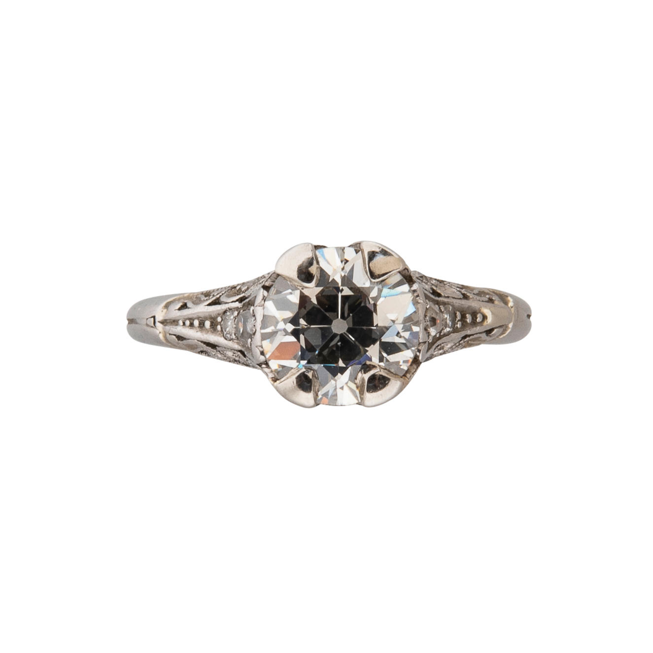 Appraisal: AN ART DECO PLATINUM AND DIAMOND RING Prong-set with an