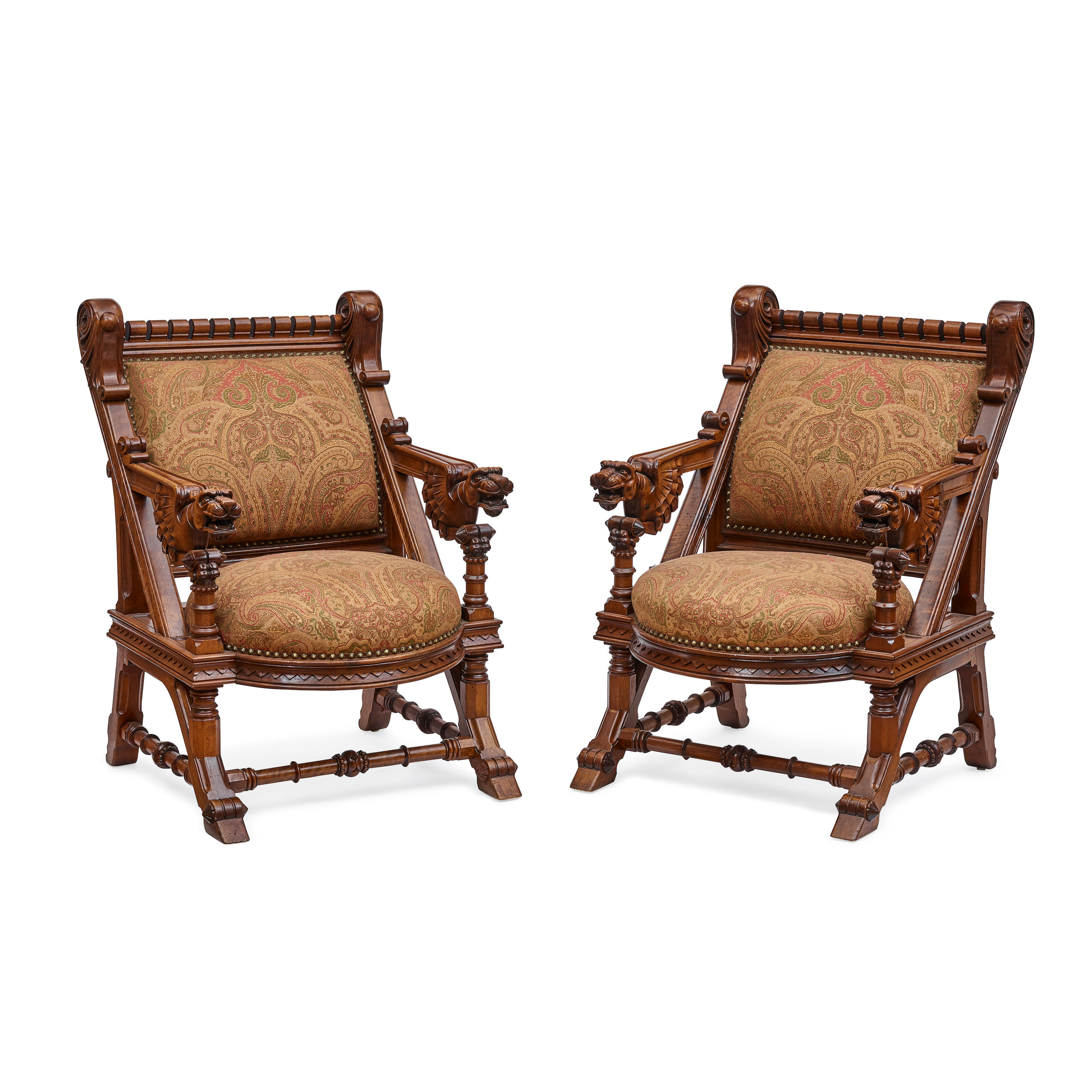 Appraisal: A PAIR OF NEO-GOTHIC UPHOLSTERED CARVED STAINED WOOD ARMCHAIRS height