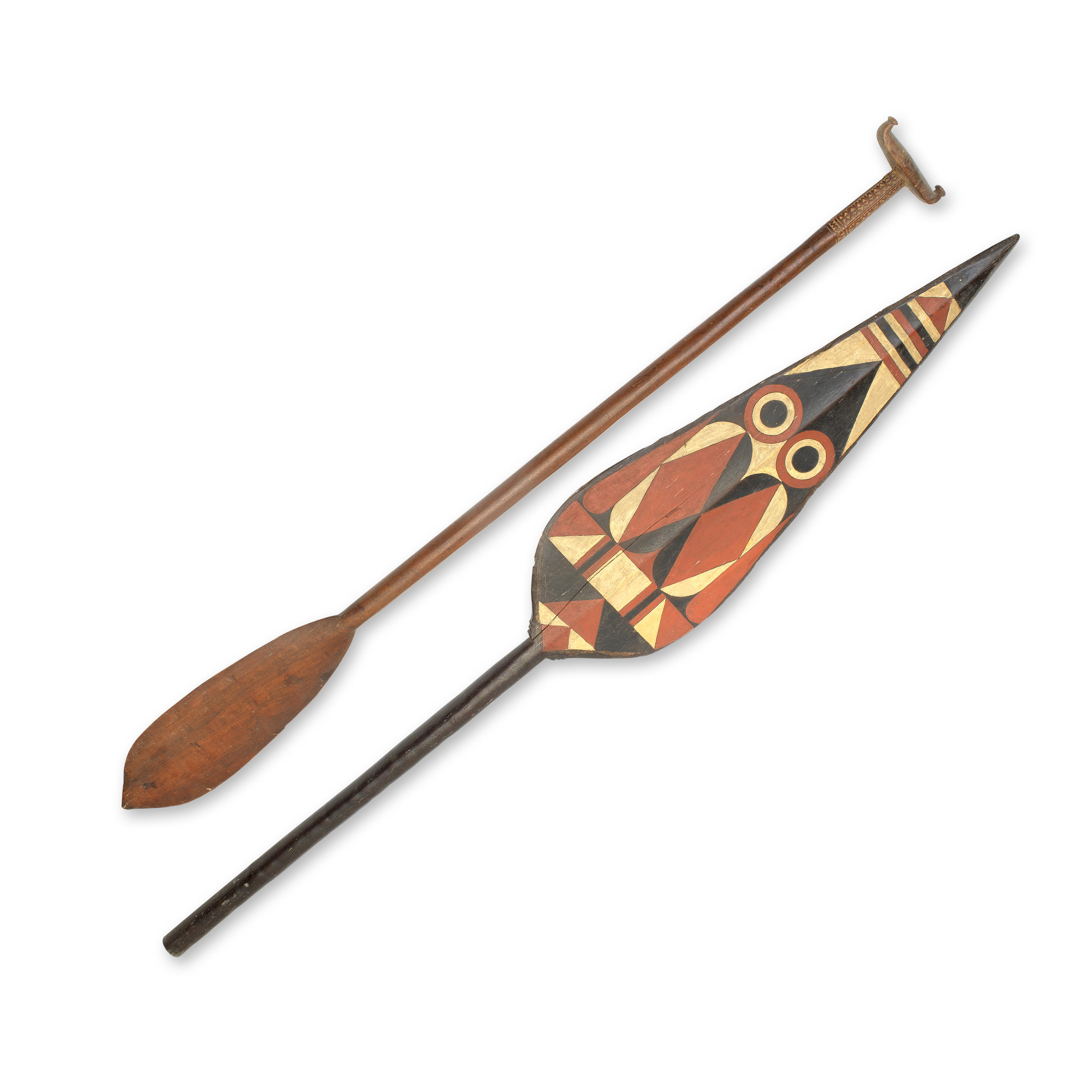 Appraisal: TWO TH CENTURY ETHNOGRAPHIC TRIBAL PADDLES The first from the