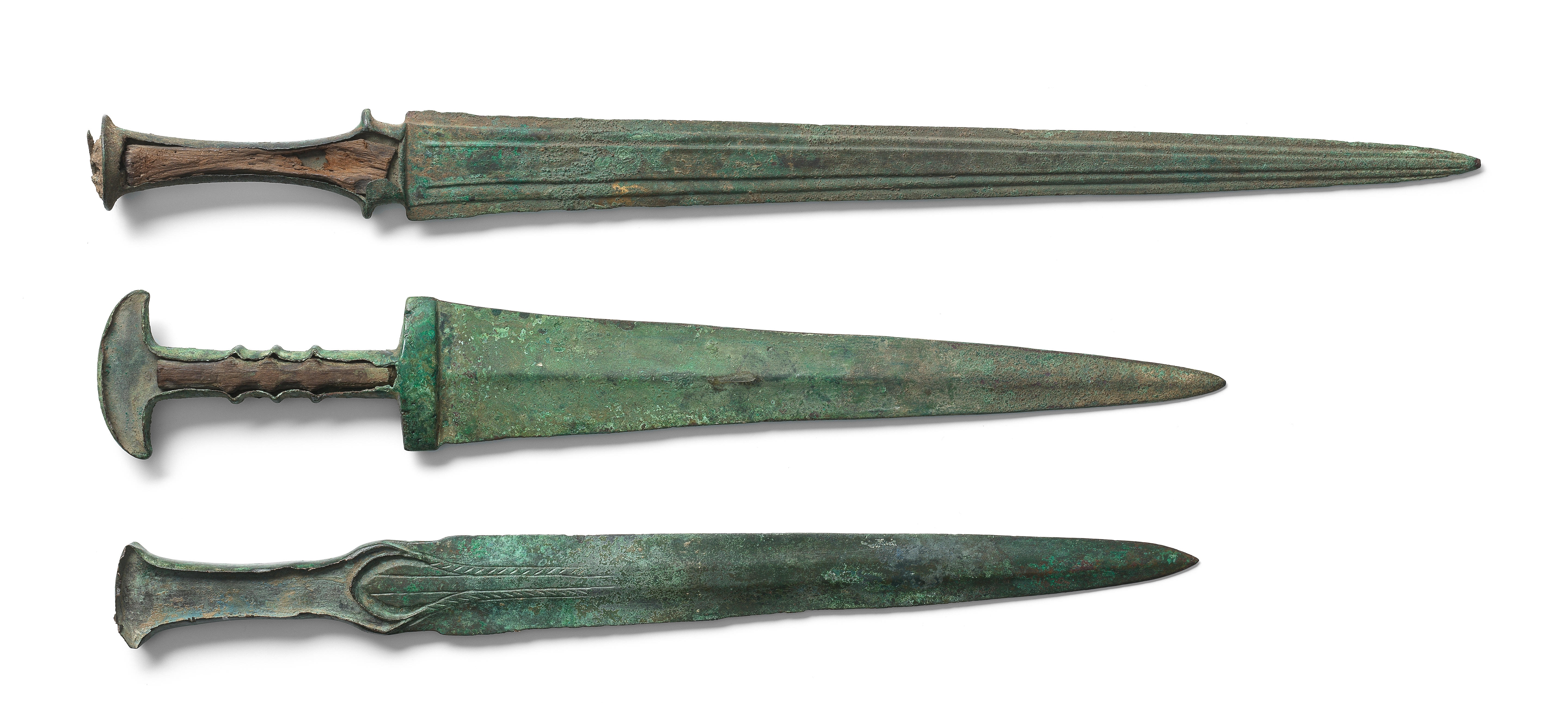 Appraisal: A GROUP OF THREE LURISTAN BRONZE SWORDS A group of