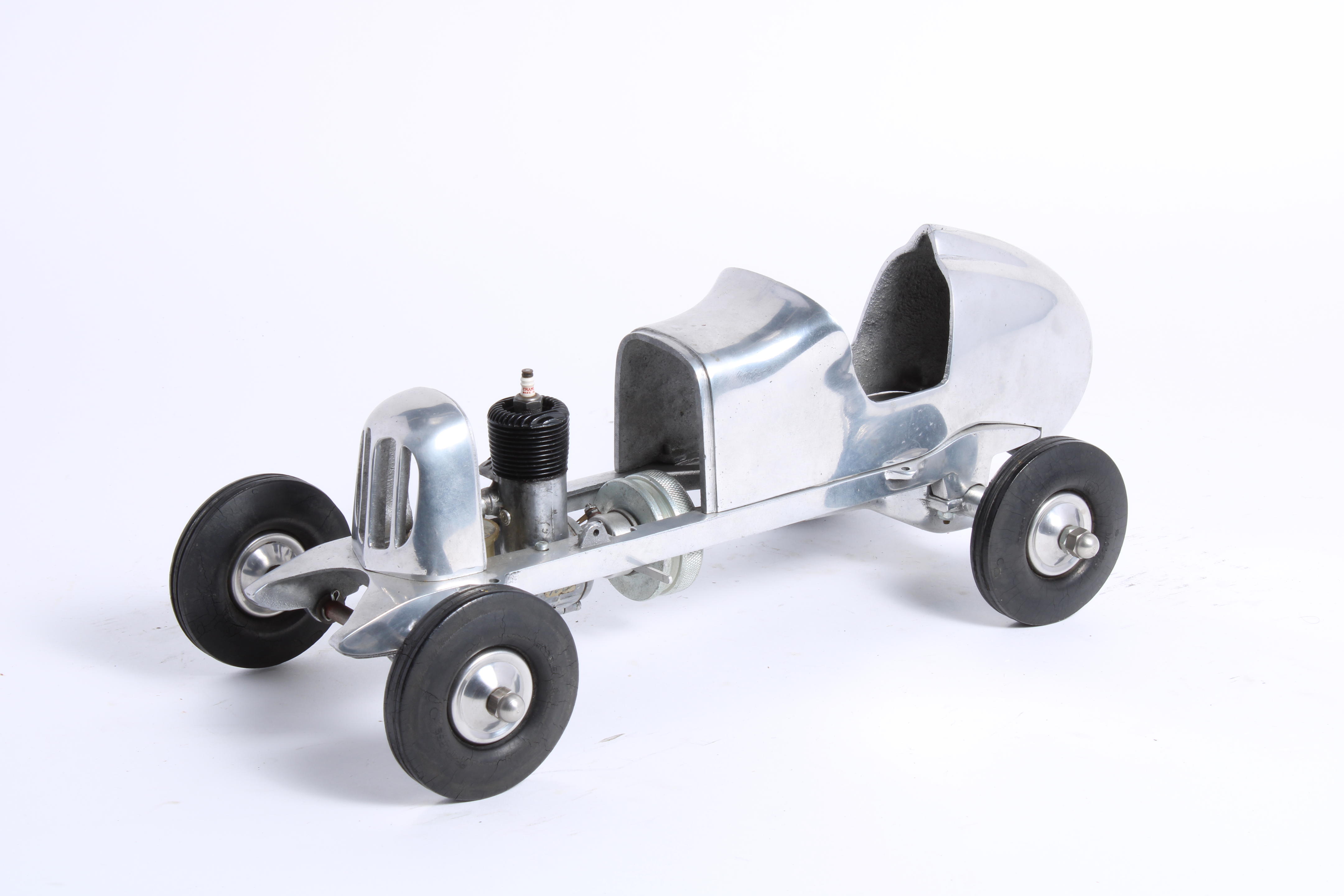 Appraisal: A MODEL PEERLESS GAS POWERED TETHERED RACECAR BY PEERLESS MODEL