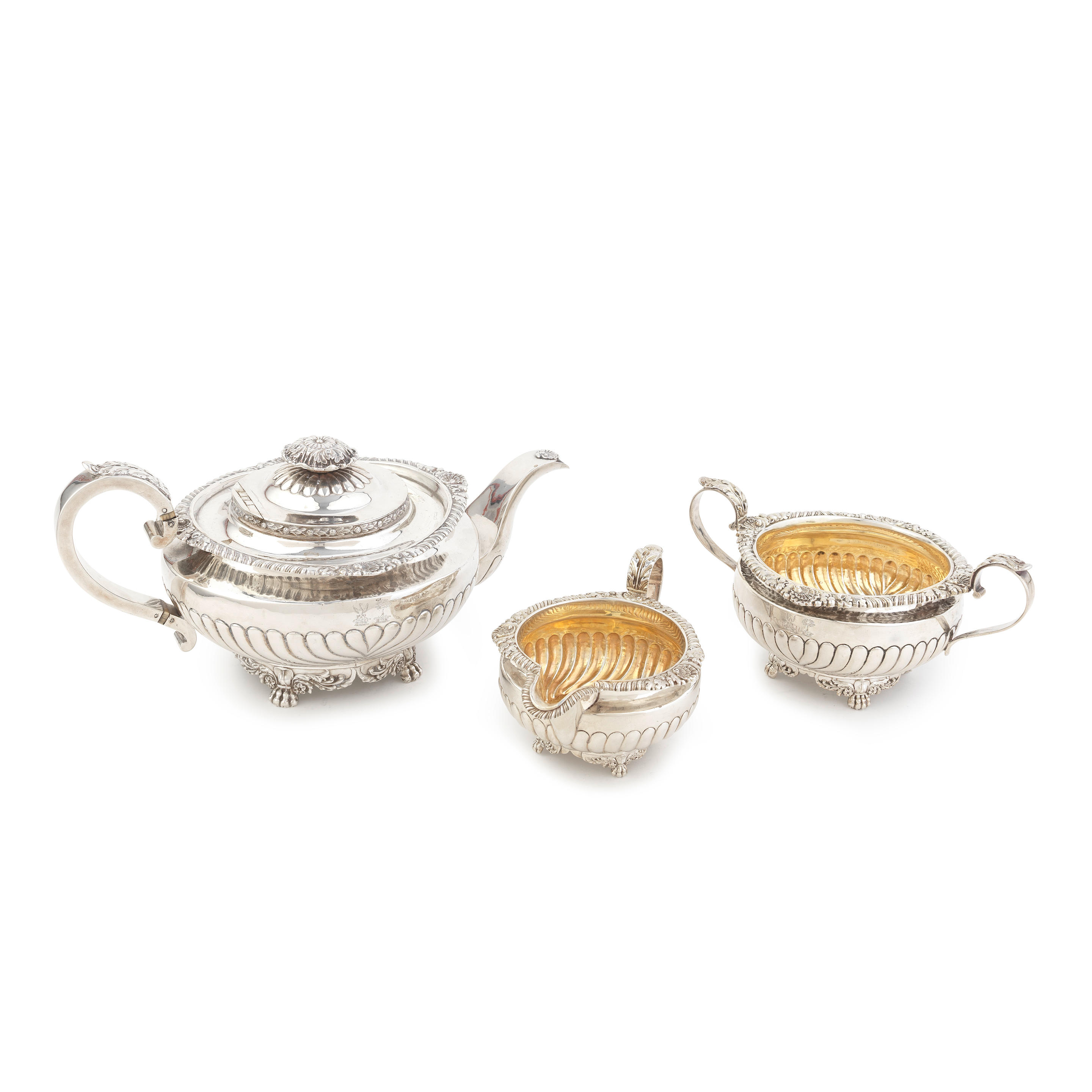 Appraisal: A GEORGE III SILVER THREE-PIECE TEA SERVICE maker's mark IW