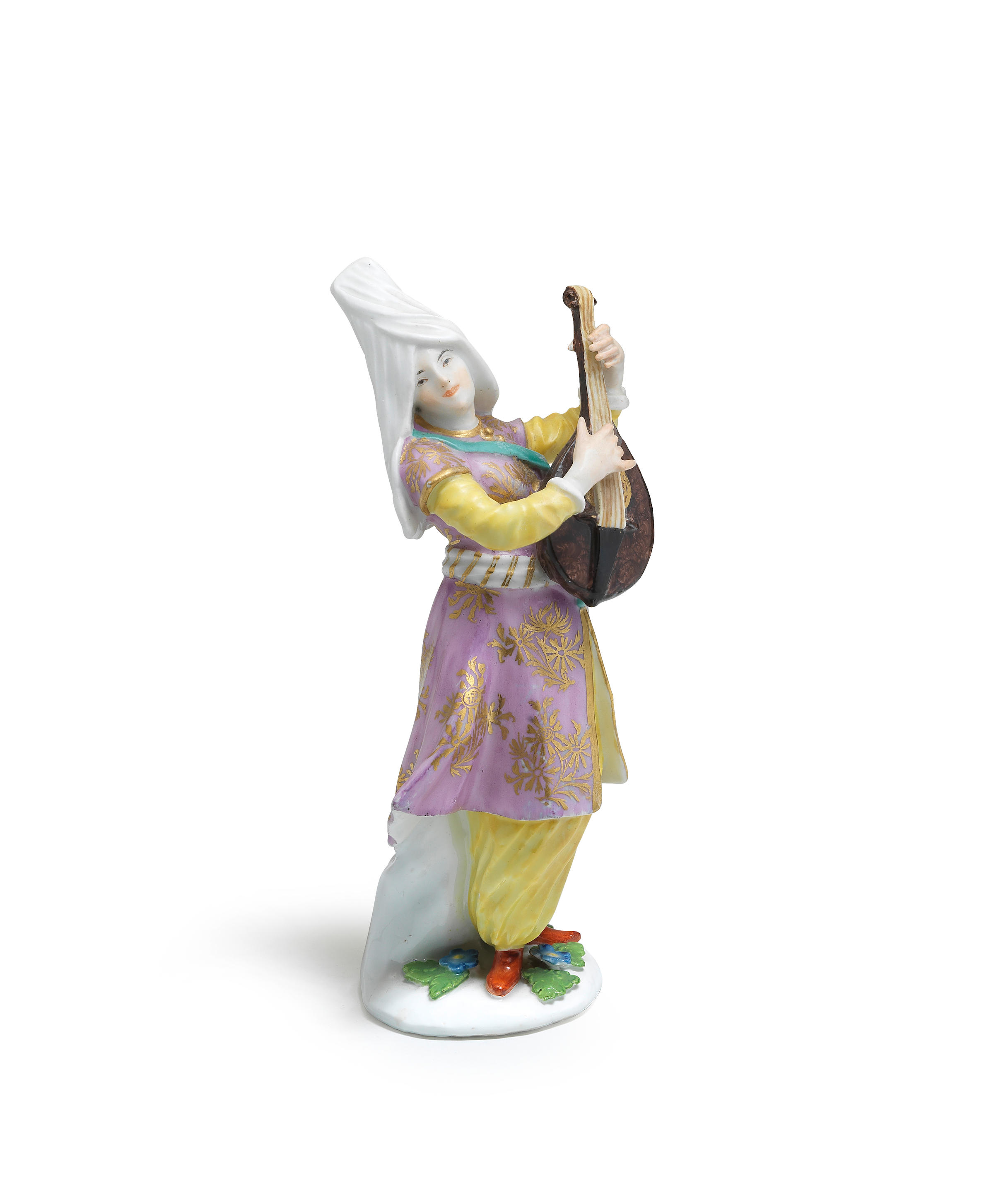 Appraisal: A MEISSEN FIGURE OF A TURKISH MUSICIAN CIRCA Playing a