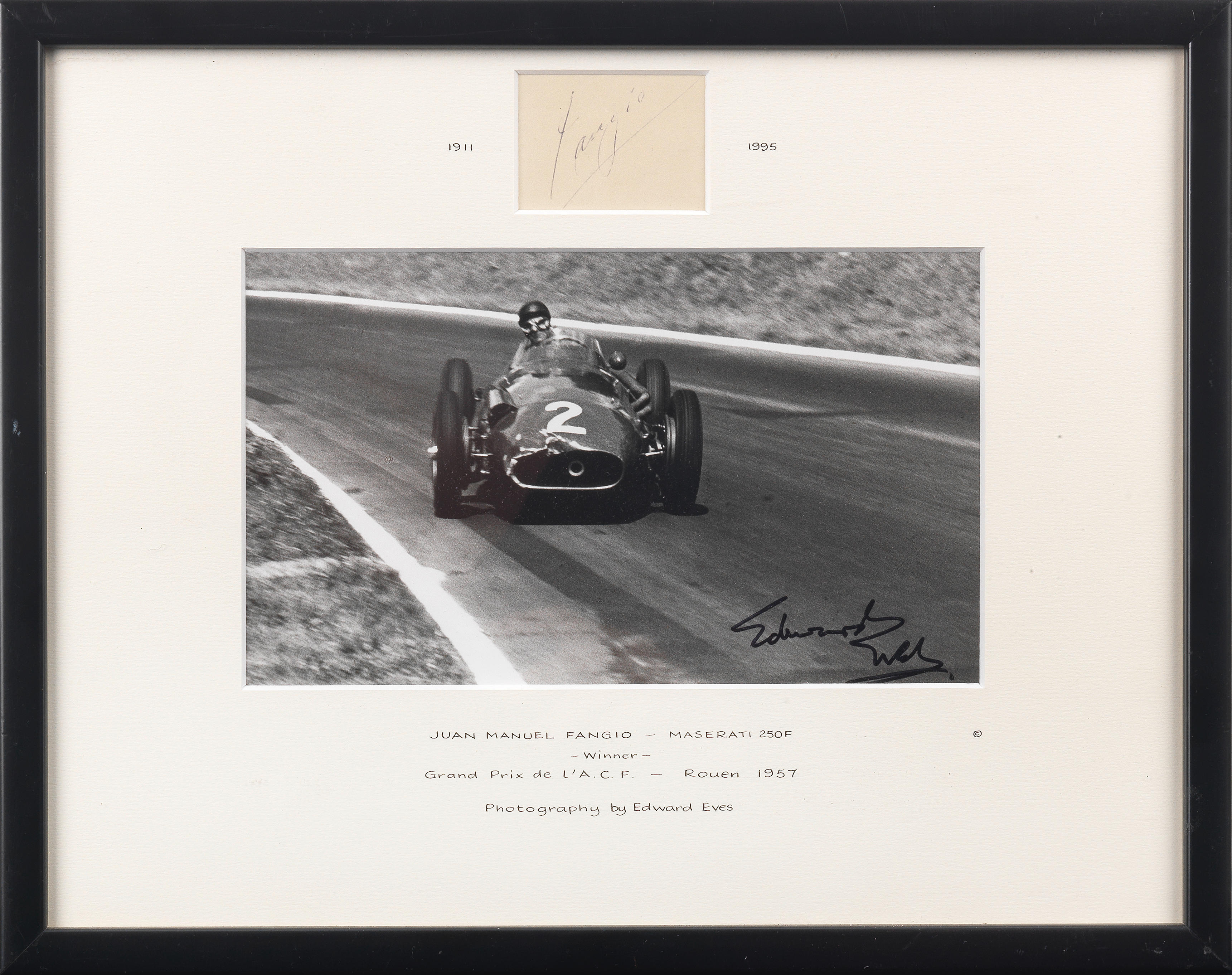 Appraisal: A FRAMED PHOTOGRAPH WITH SIGNATURE OF JUAN MANUEL FANGIO IN