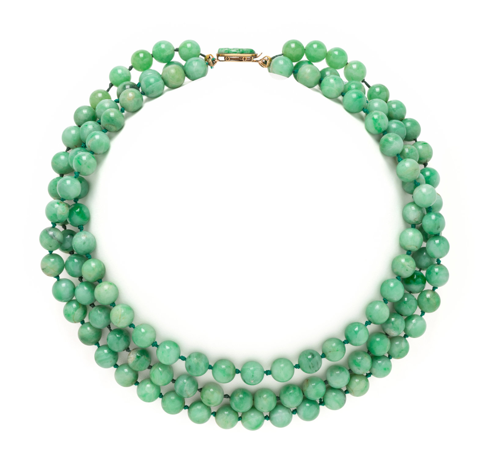 Appraisal: JADEITE BEAD NECKLACE Consisting of three strands of round jade