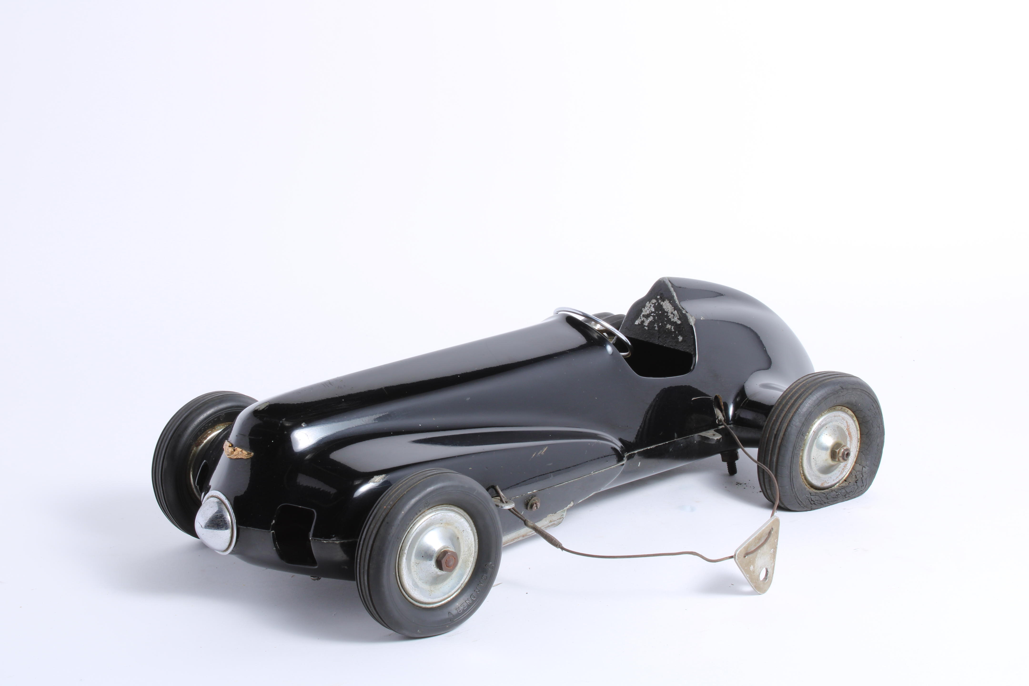 Appraisal: AN UNUSUAL TETHER RACECAR BODY AMERICAN LATE S- S black