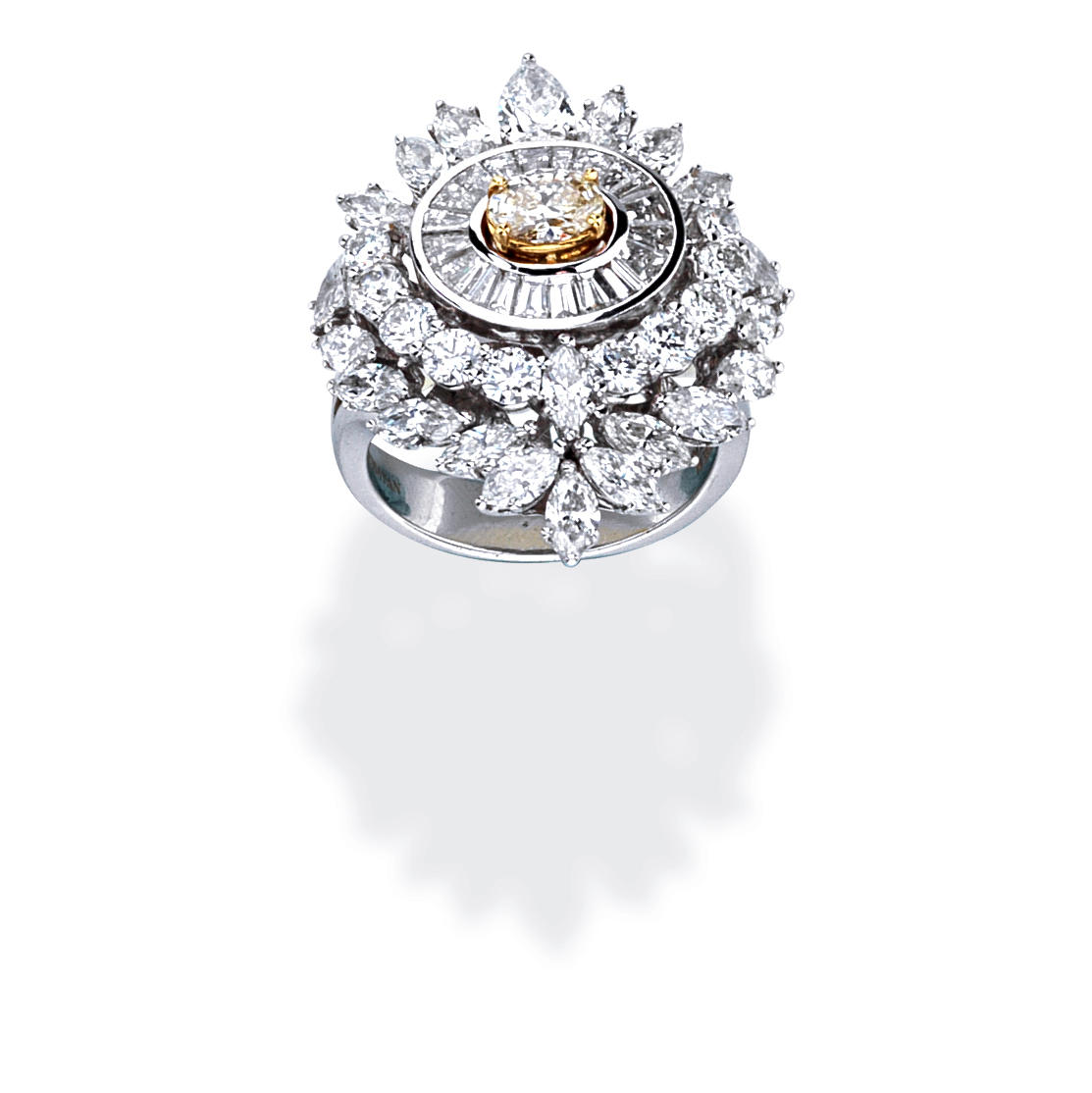 Appraisal: YESSAYAN DIAMOND CLUSTER RING Set with an oval-shaped diamond of