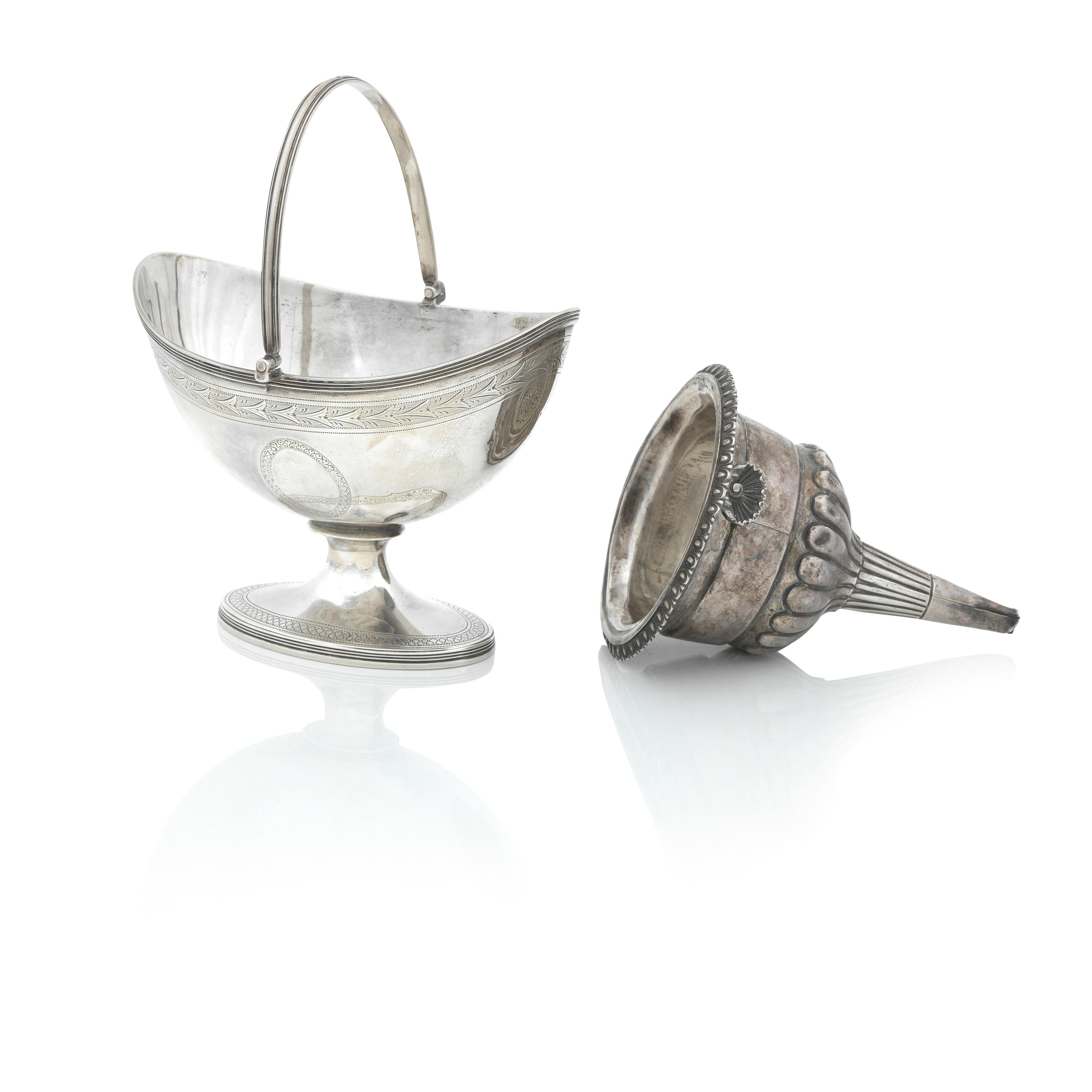 Appraisal: A GEORGE III SILVER SUGAR BASKET by John Emes London