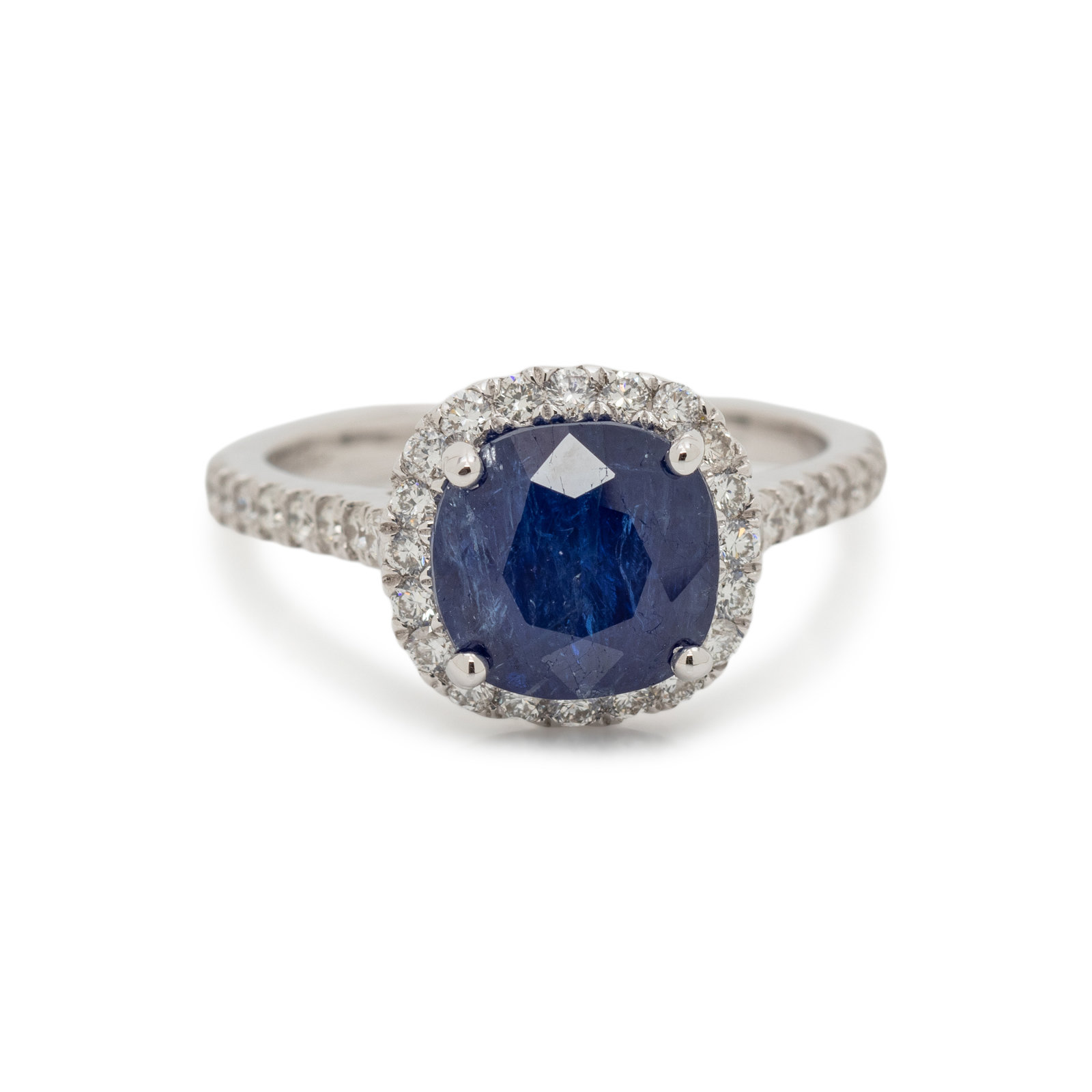 Appraisal: BURMESE SAPPHIRE AND DIAMOND RING Containing one cushion mixed cut