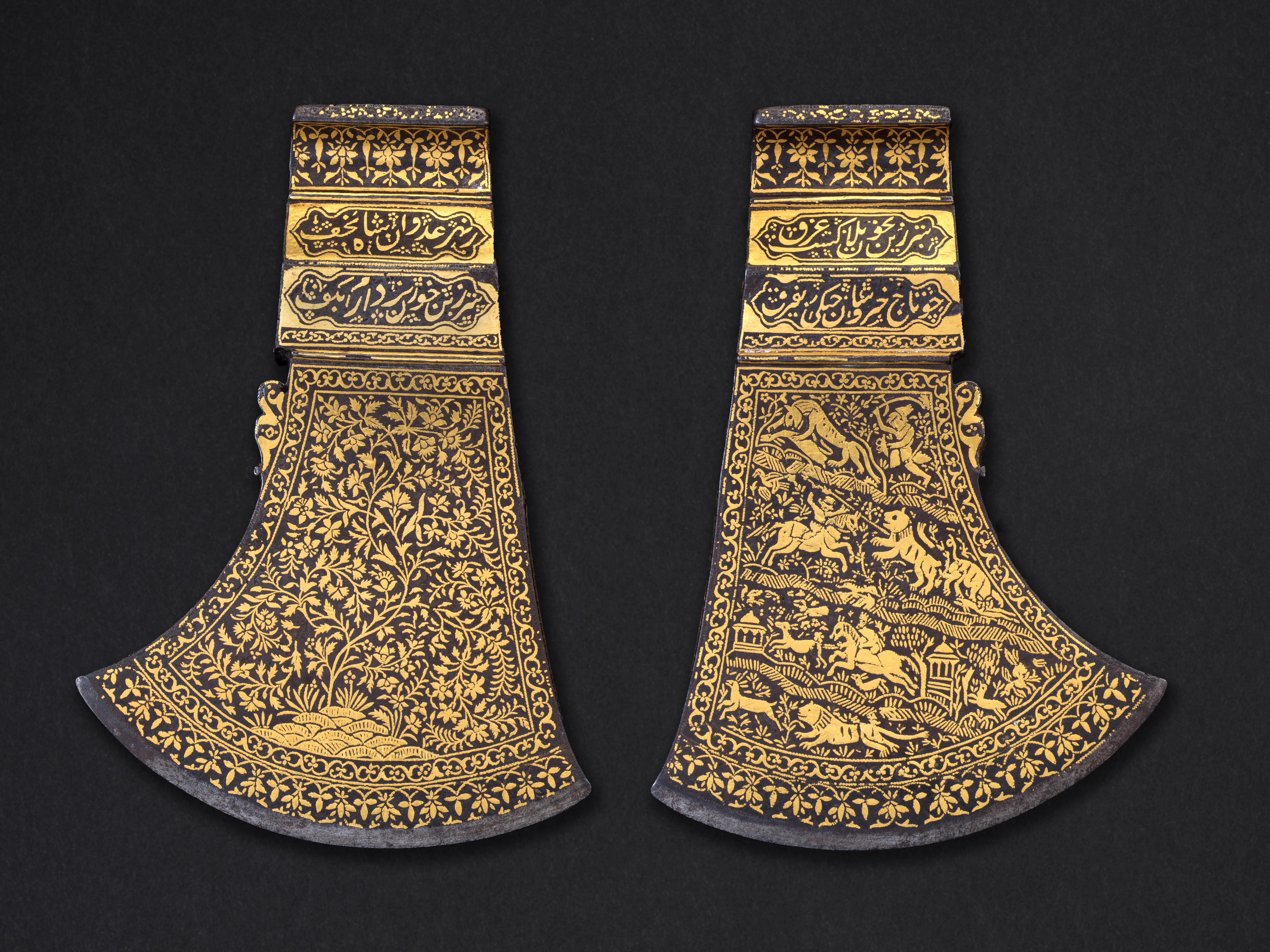 Appraisal: A FINE GOLD-INLAID STEEL AXE HEAD SIGNED BY MUHAMMAD SADIQ