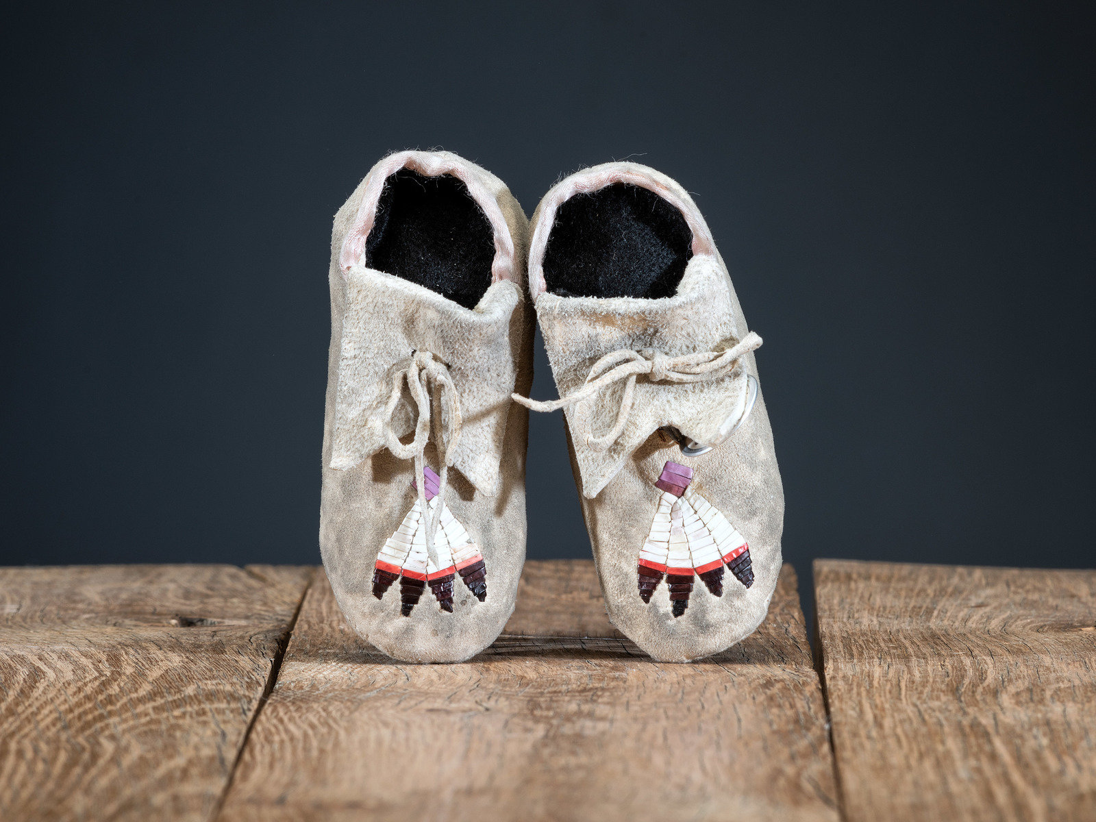 Appraisal: Fort Berthold Infant's Quilled Hide Moccasins ca thread-sewn vamps quilled