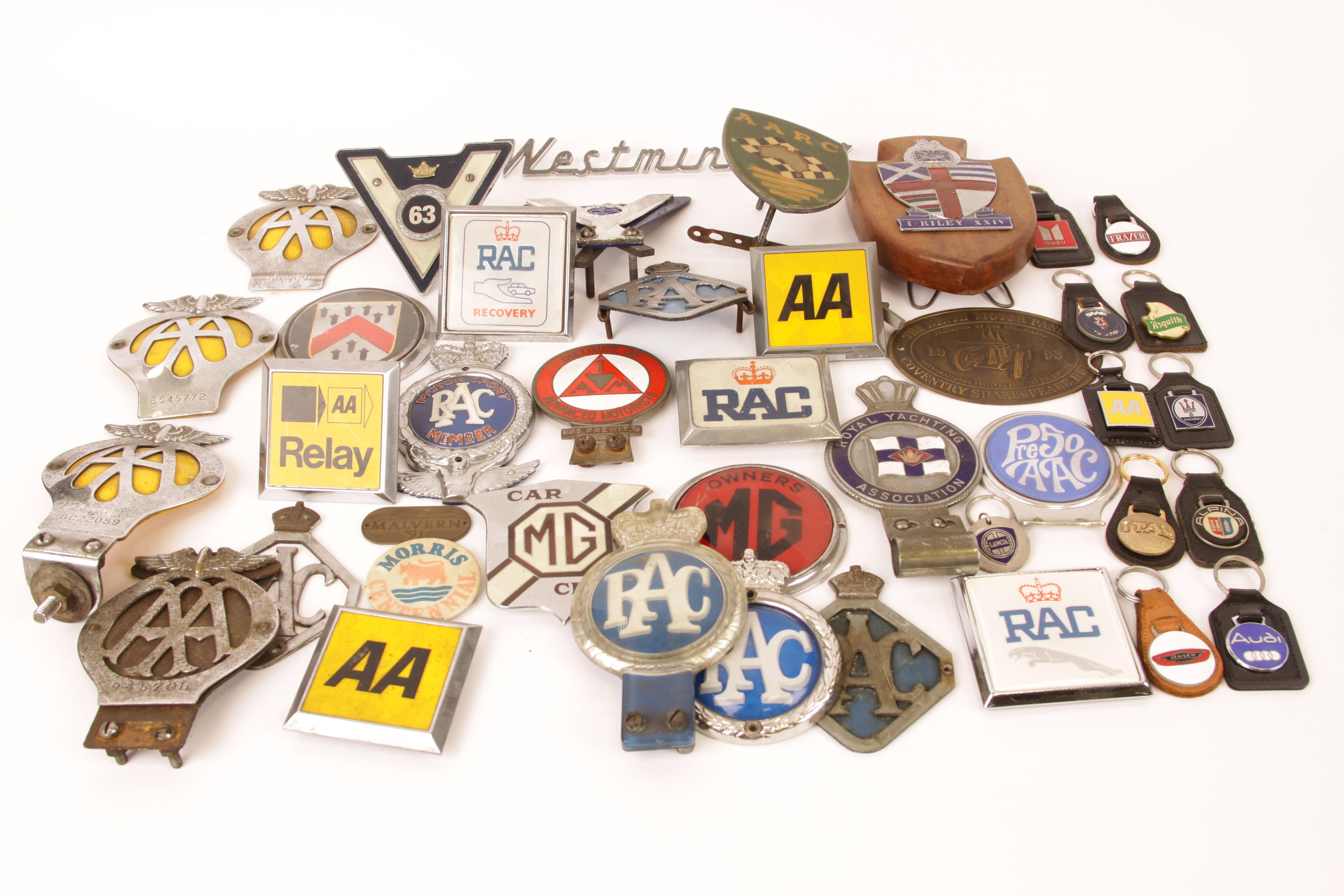 Appraisal: ASSORTED MOTORING BADGES AND KEY FOBS badges including AARC Australian