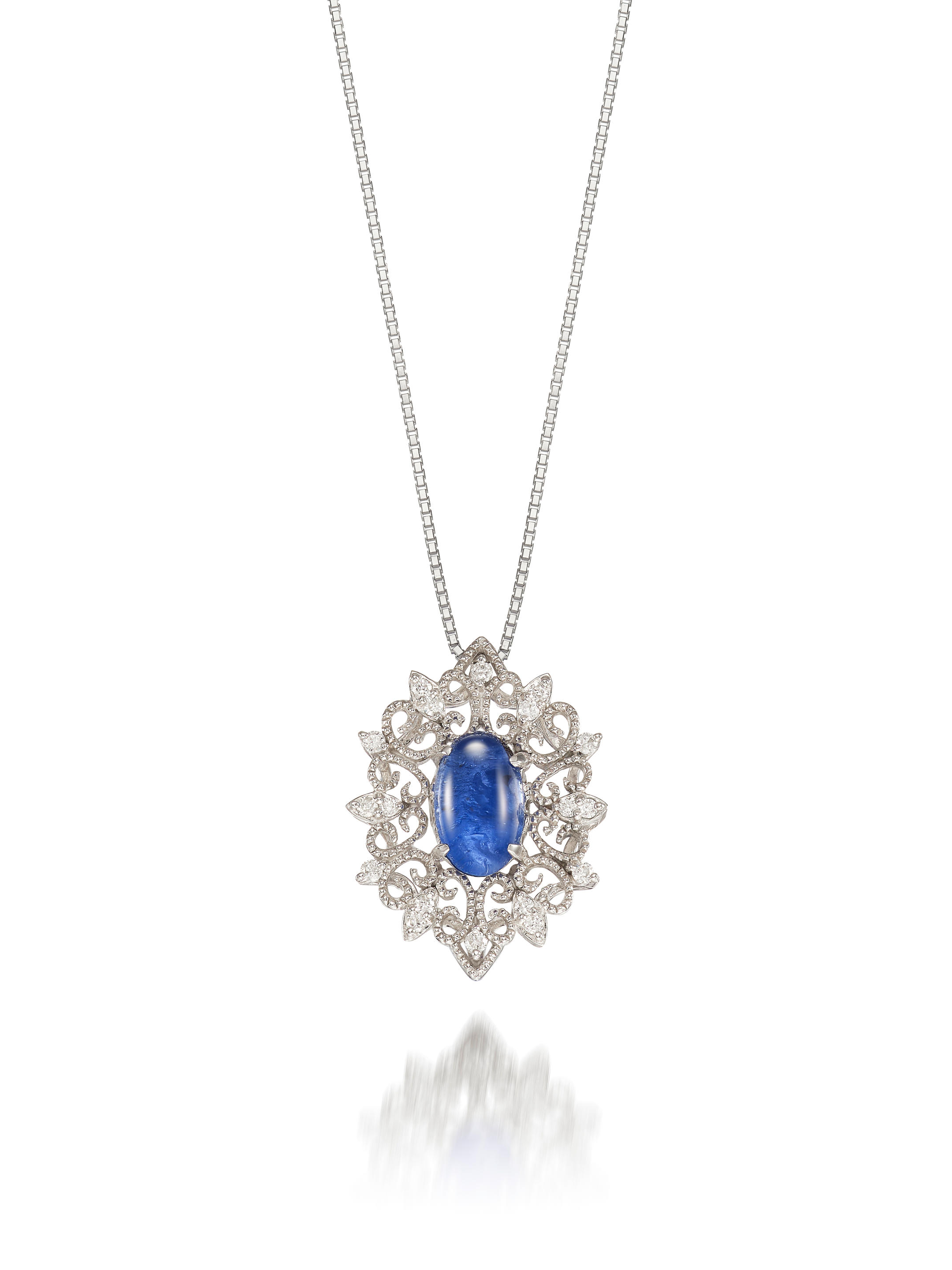 Appraisal: STAR SAPPHIRE AND DIAMOND PENDANT NECKLACE The detachable pendant set