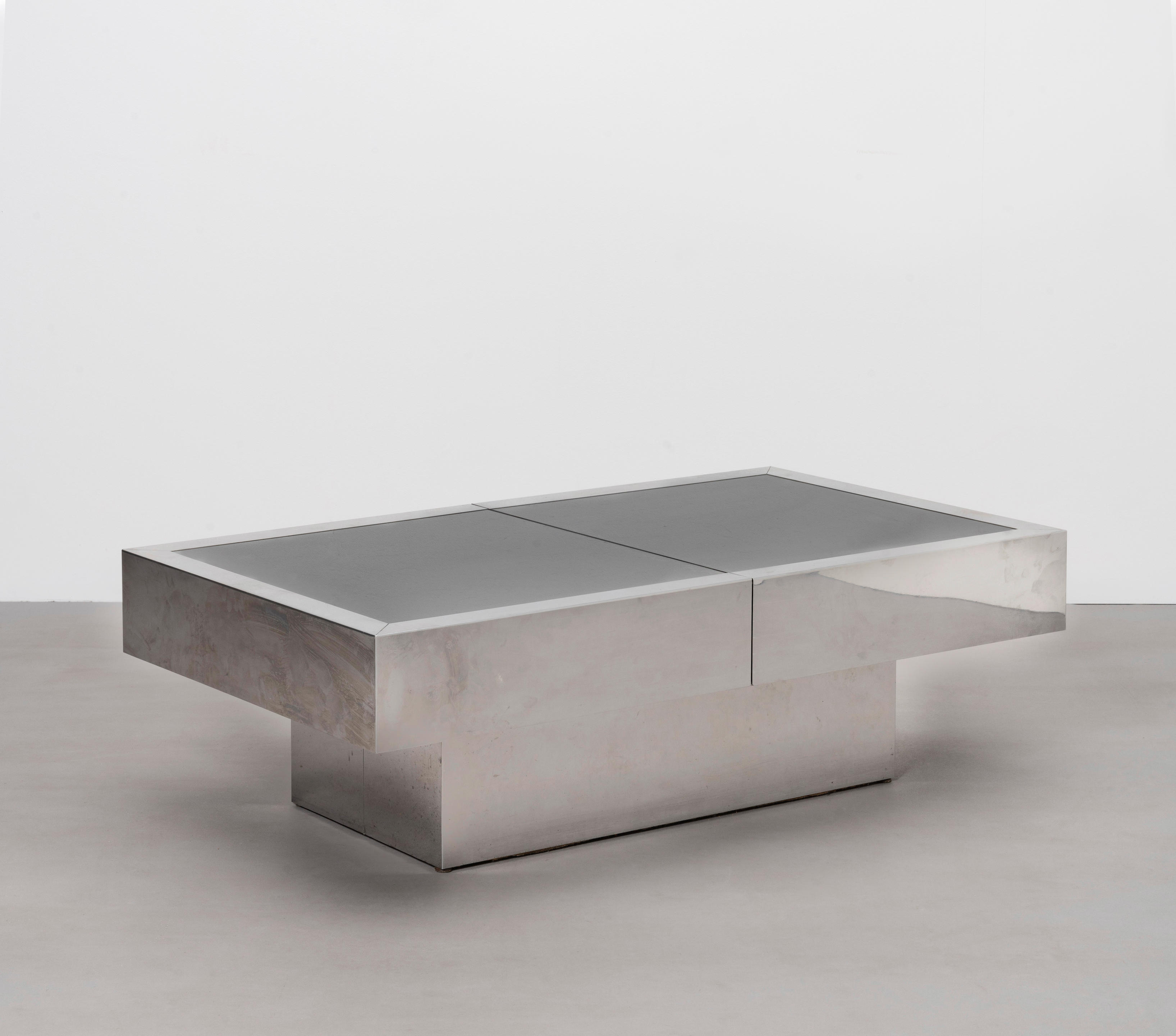 Appraisal: ATTRIBUTED TO WILLY RIZZO Cocktail table circa Brushed steel stainless