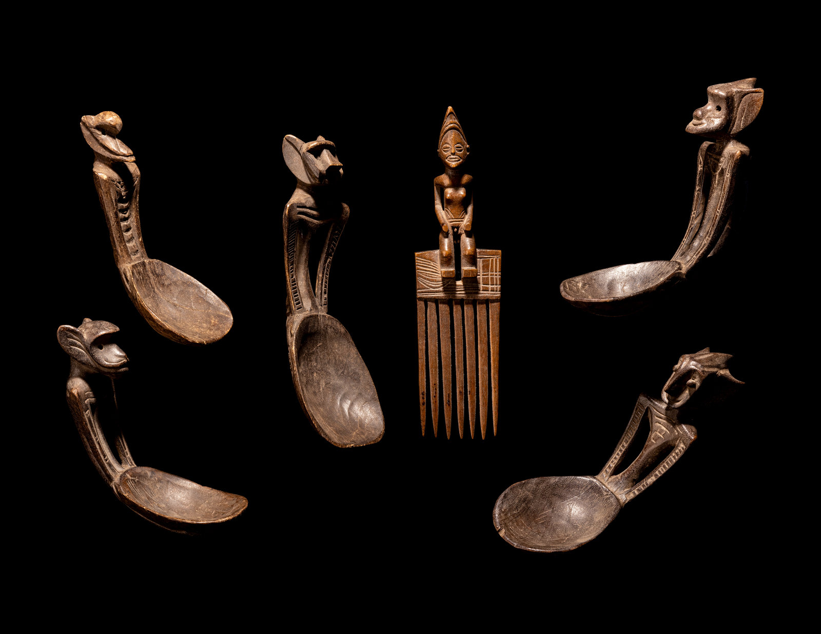 Appraisal: Five African Wood Spoons and a Comb Length of longest