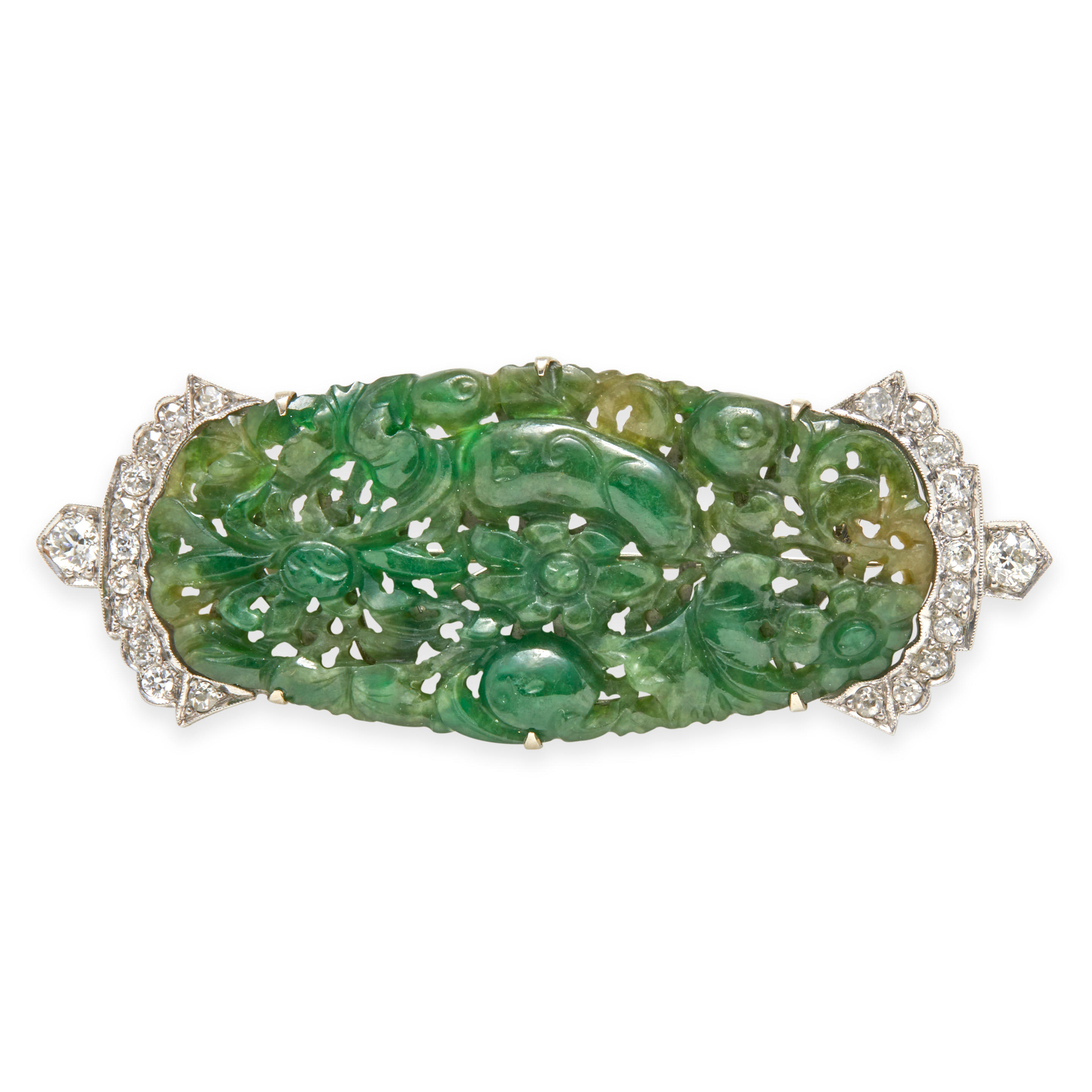 Appraisal: AN ART DECO JADE AND DIAMOND BROOCH Centering a carved