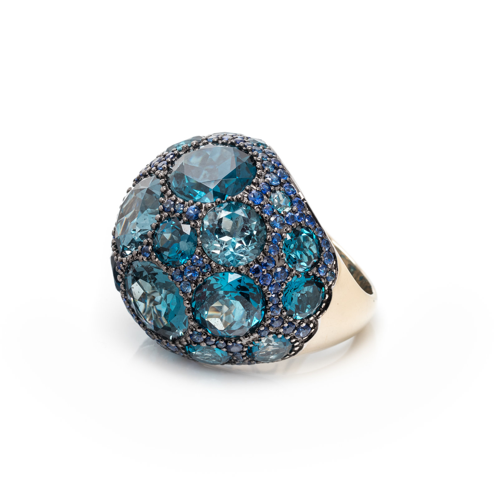 Appraisal: BLUE TOPAZ AND SAPPHIRE RING Containing numerous round mixed cut