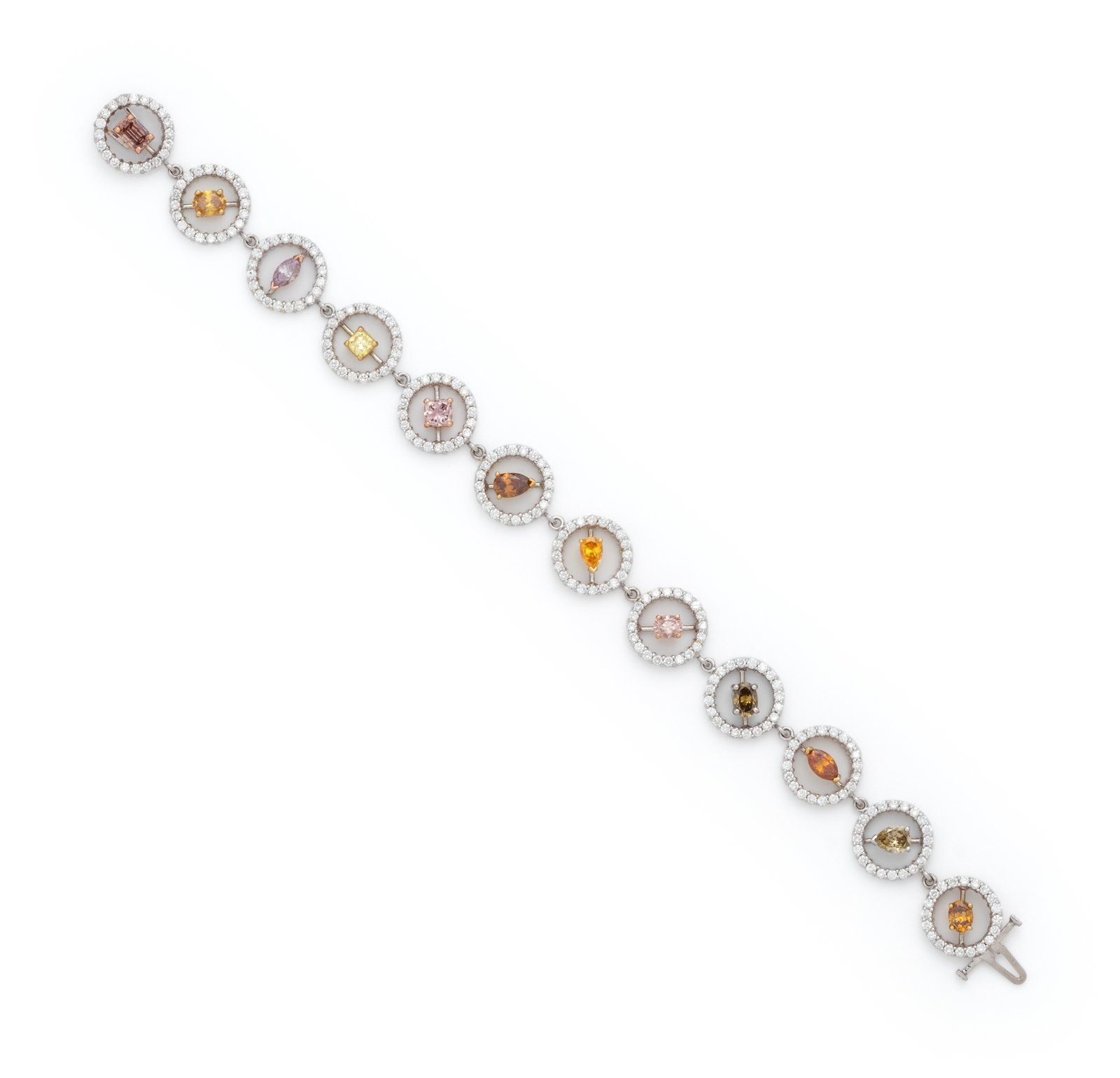 Appraisal: WHITE GOLD COLORED DIAMOND AND DIAMOND BRACELET Containing colored diamonds