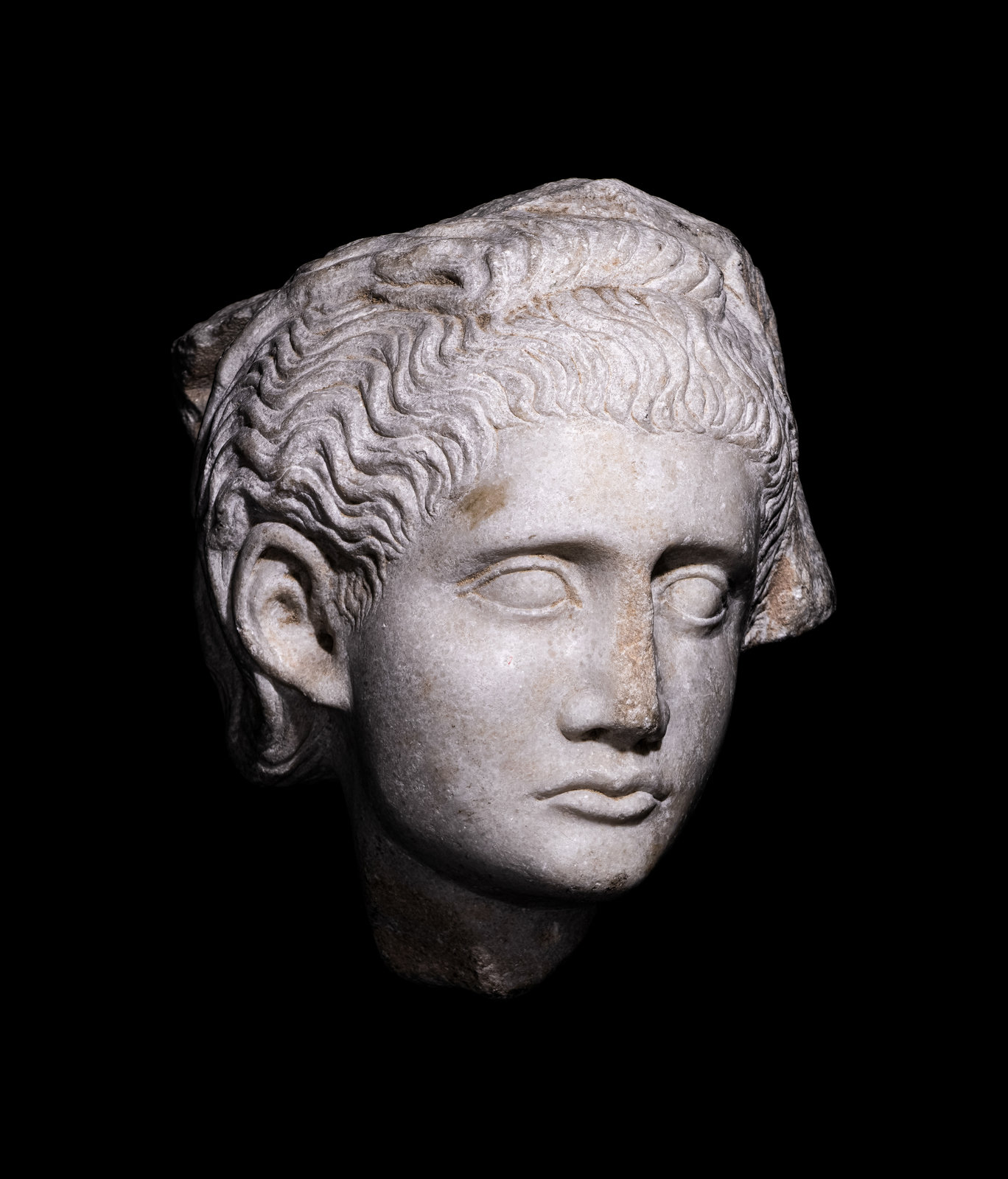 Appraisal: A Roman Marble Relief with a Female Head Severan Period