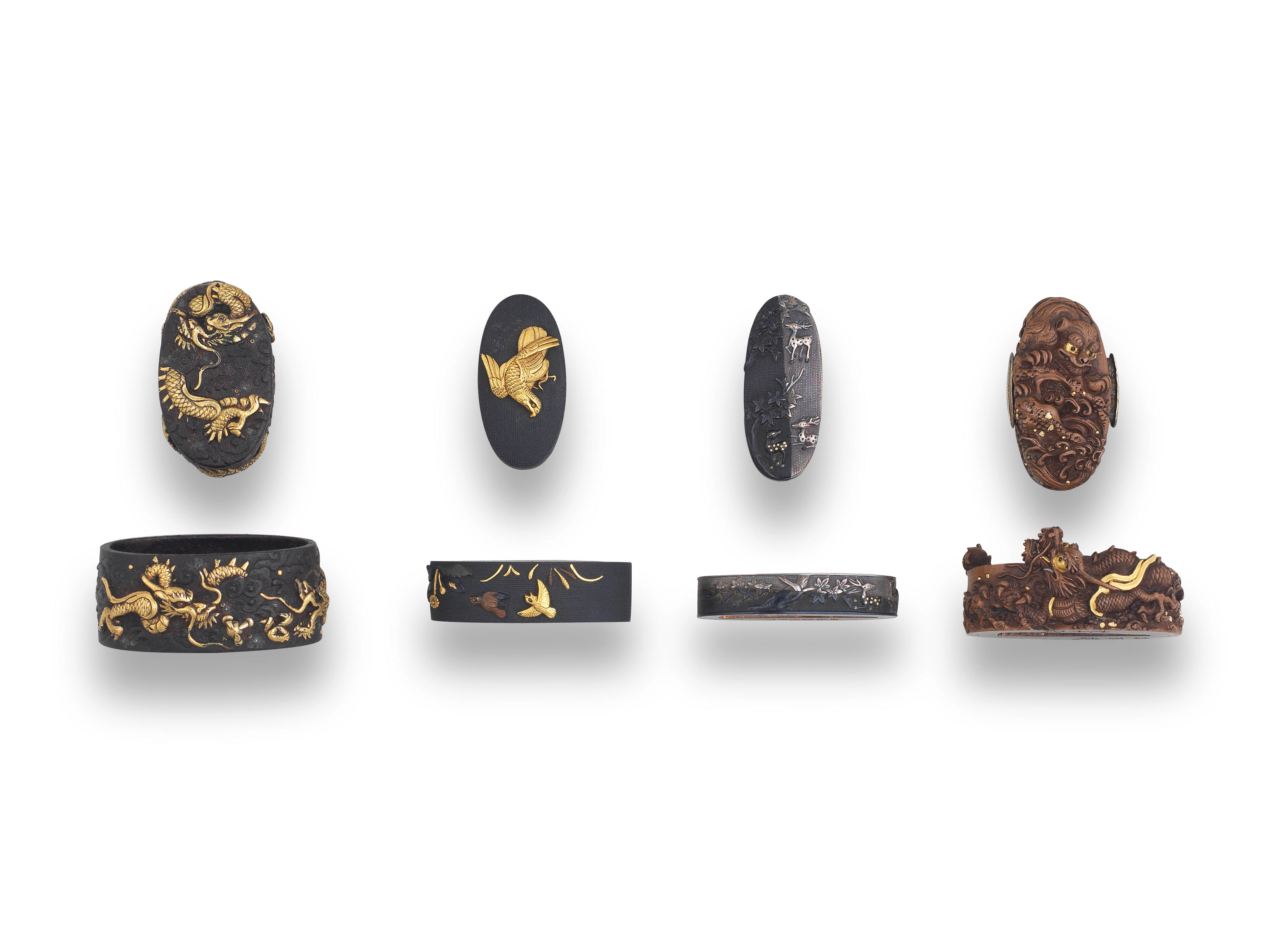 Appraisal: FOUR FUCHI-GASHIRA HILT COLLARS AND POMMELS Edo period - th