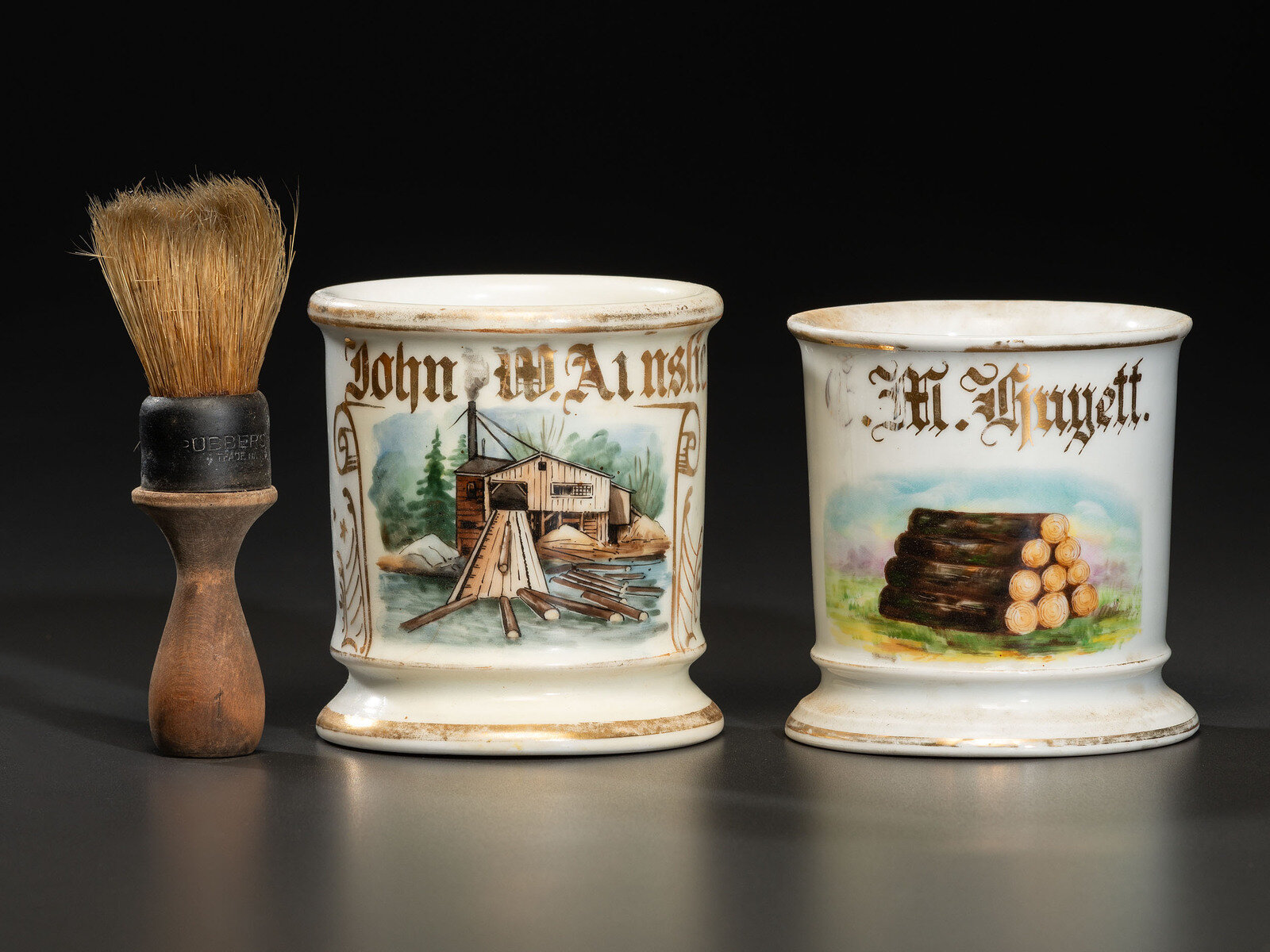 Appraisal: Two Loggers' Porcelain Occupational Shaving Mugs Late th Early th