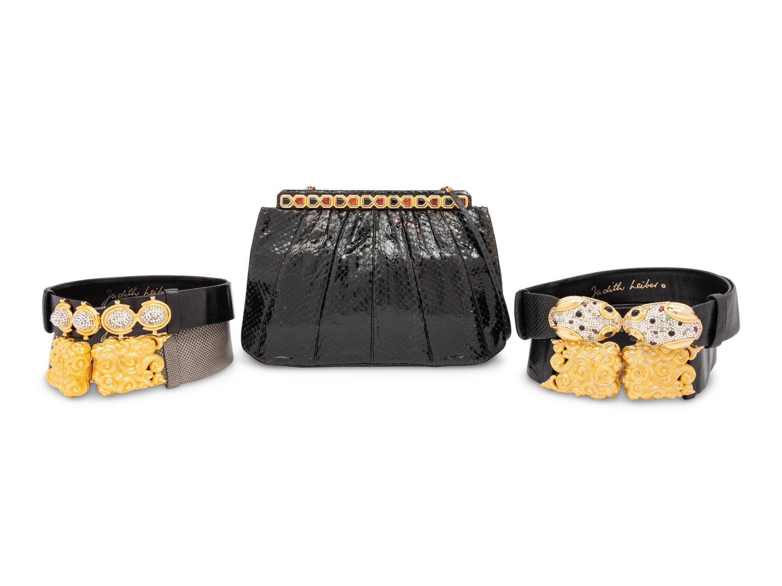 Appraisal: Judith Leiber Snakeskin Clutch and Four Snakeskin Belts - s