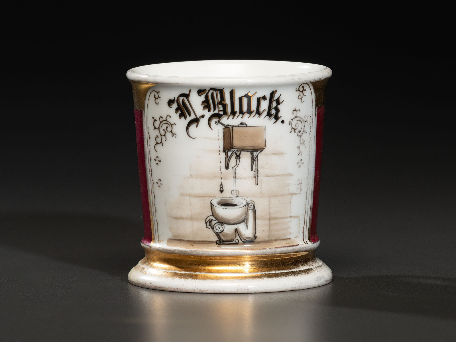 Appraisal: A Plumber's Porcelain Occupational Shaving Mug Late th Early th