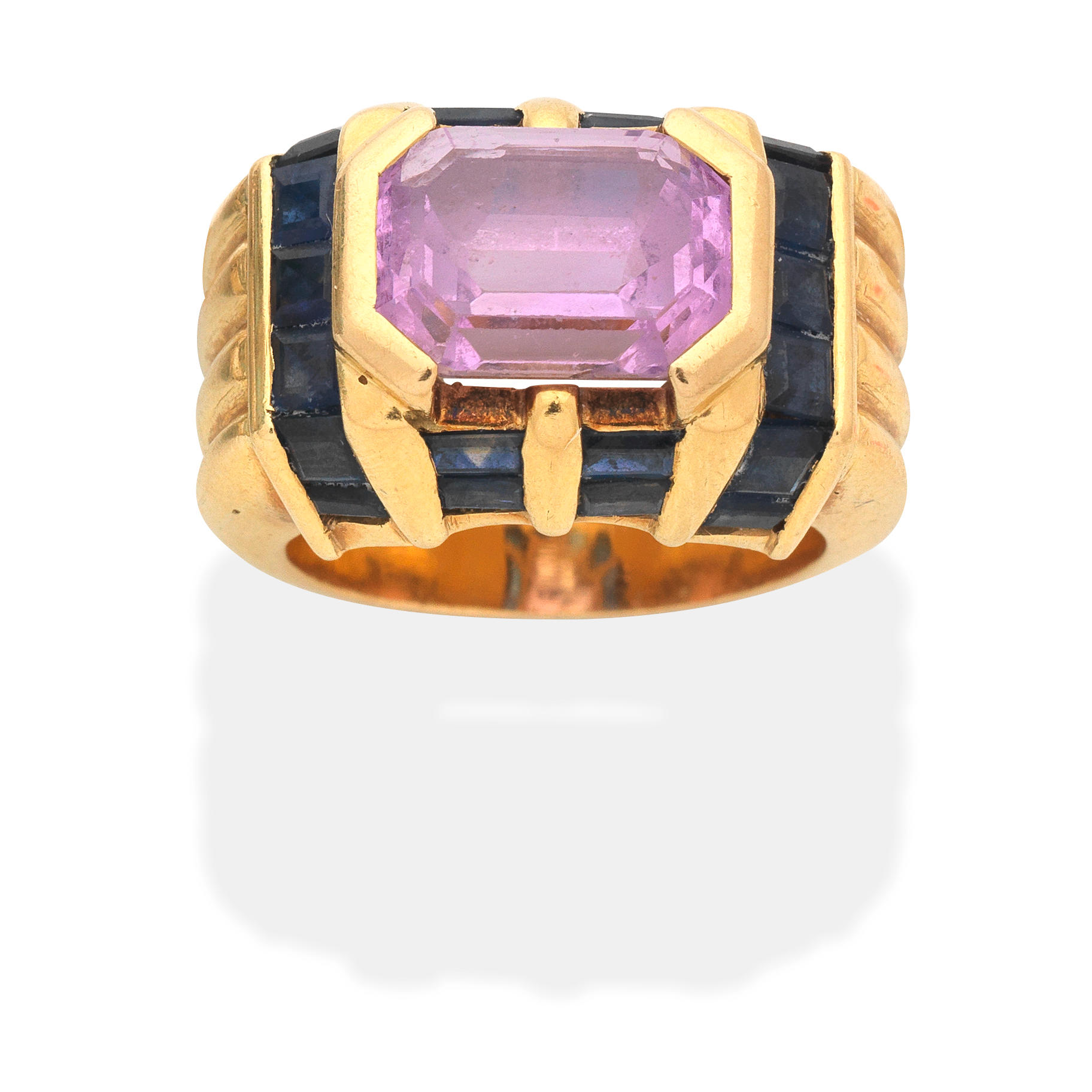 Appraisal: PINK SAPPHIRE AND SAPPHIRE DRESS RING Step-cut pink sapphire square