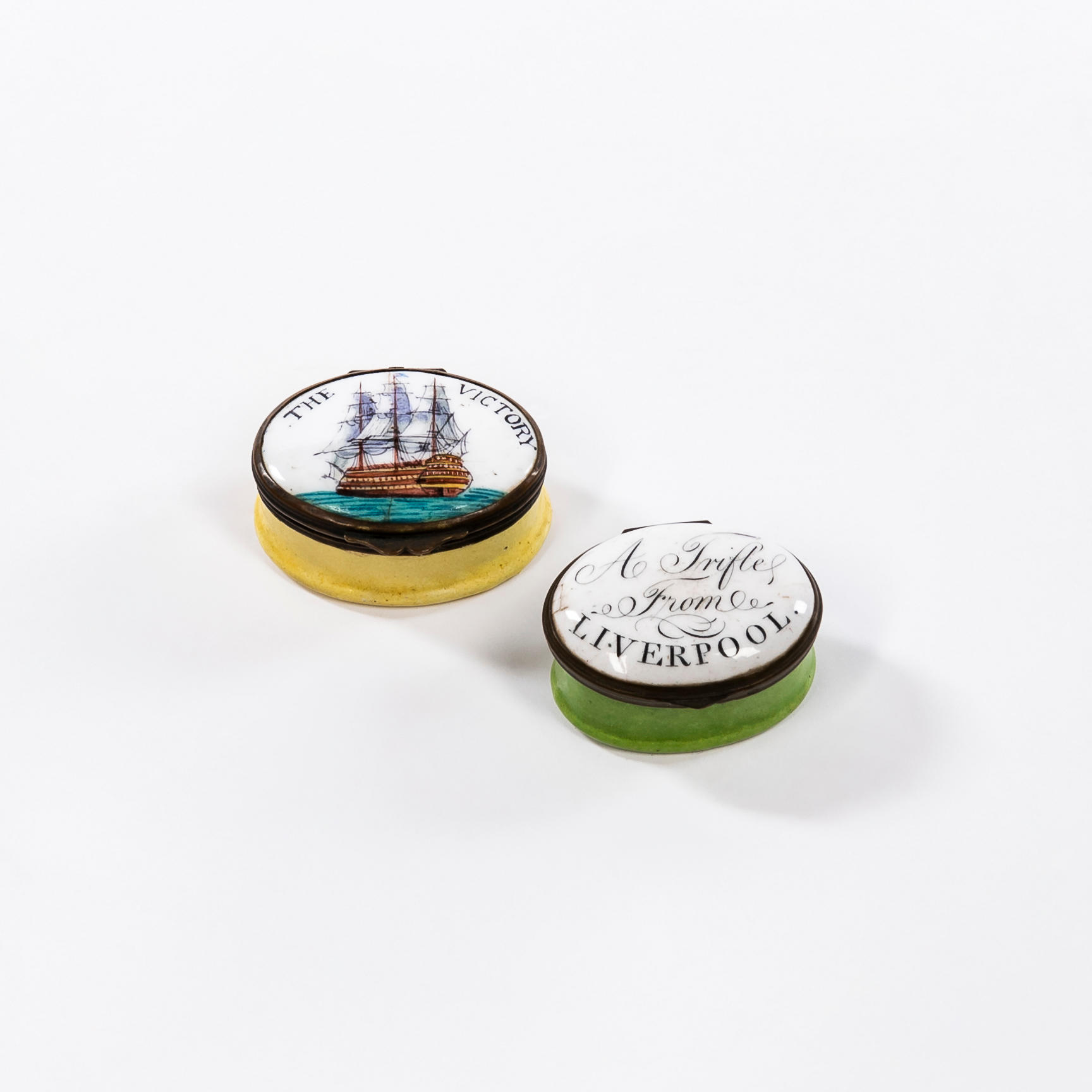 Appraisal: TWO ENAMEL-DECORATED PILL BOXES Liverpool England early th century Small