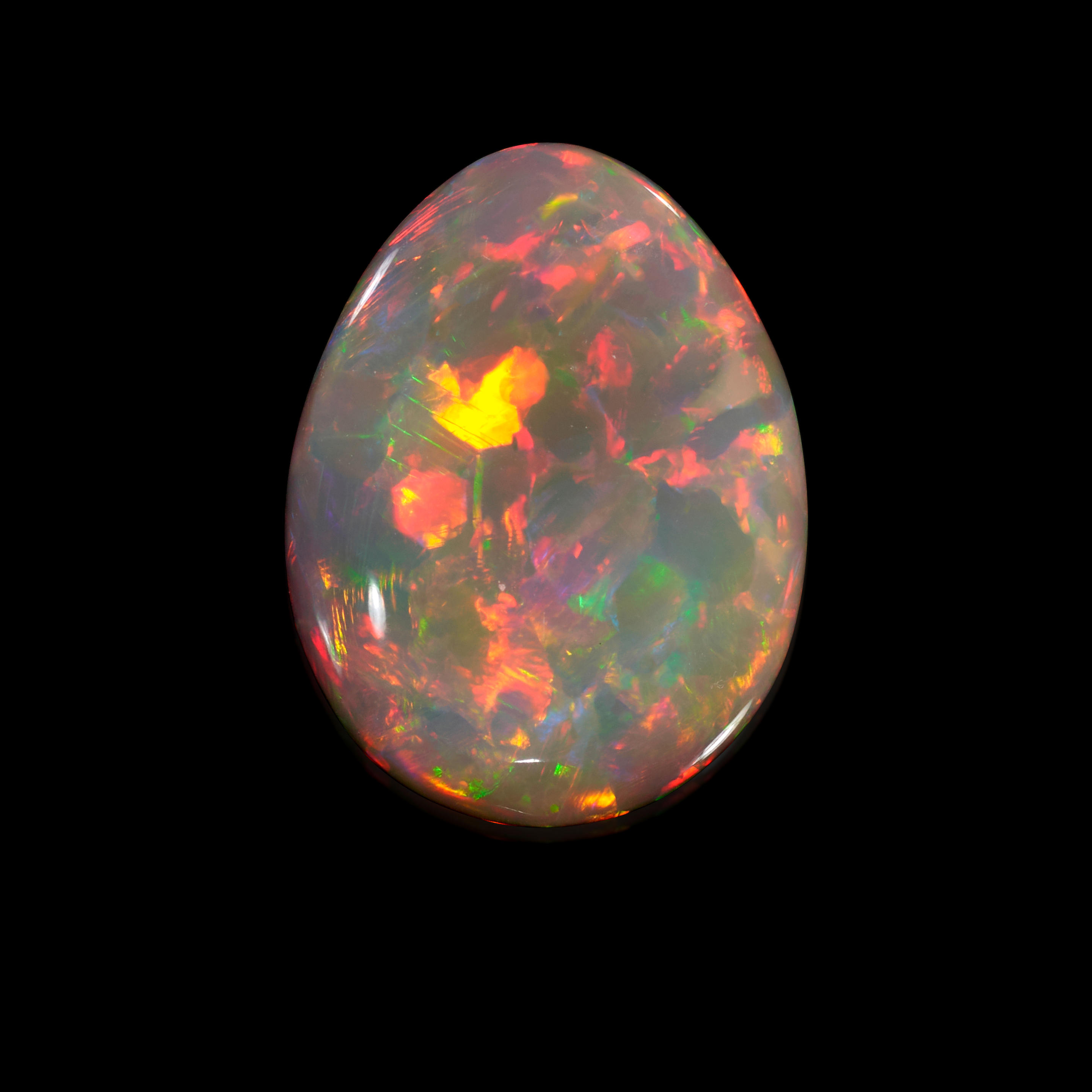 Appraisal: WELO OPAL CABOCHON A pear-shaped crystal opal cabochon with a