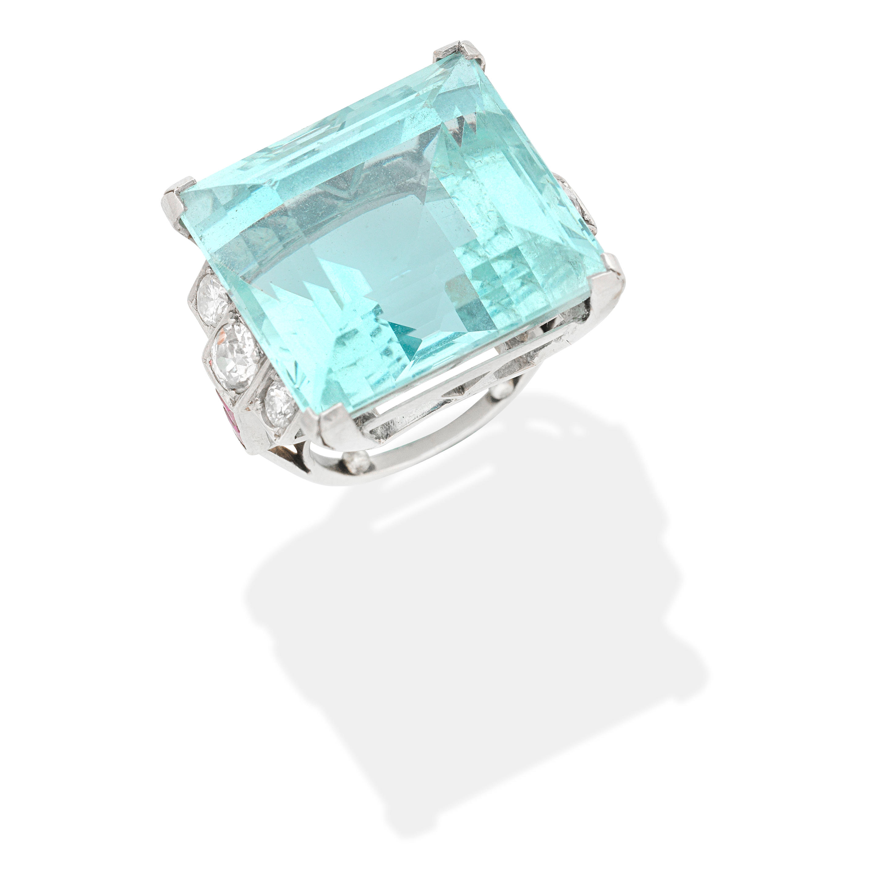 Appraisal: AQUAMARINE RUBY AND DIAMOND RING Step-cut aquamarine old brilliant-cut diamonds