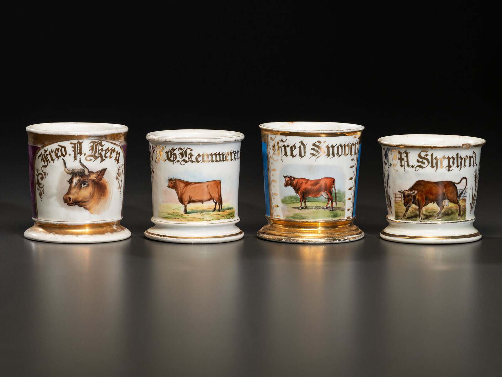 Appraisal: Four Porcelain Occupational Shaving Mugs of Bovine Interest Late th