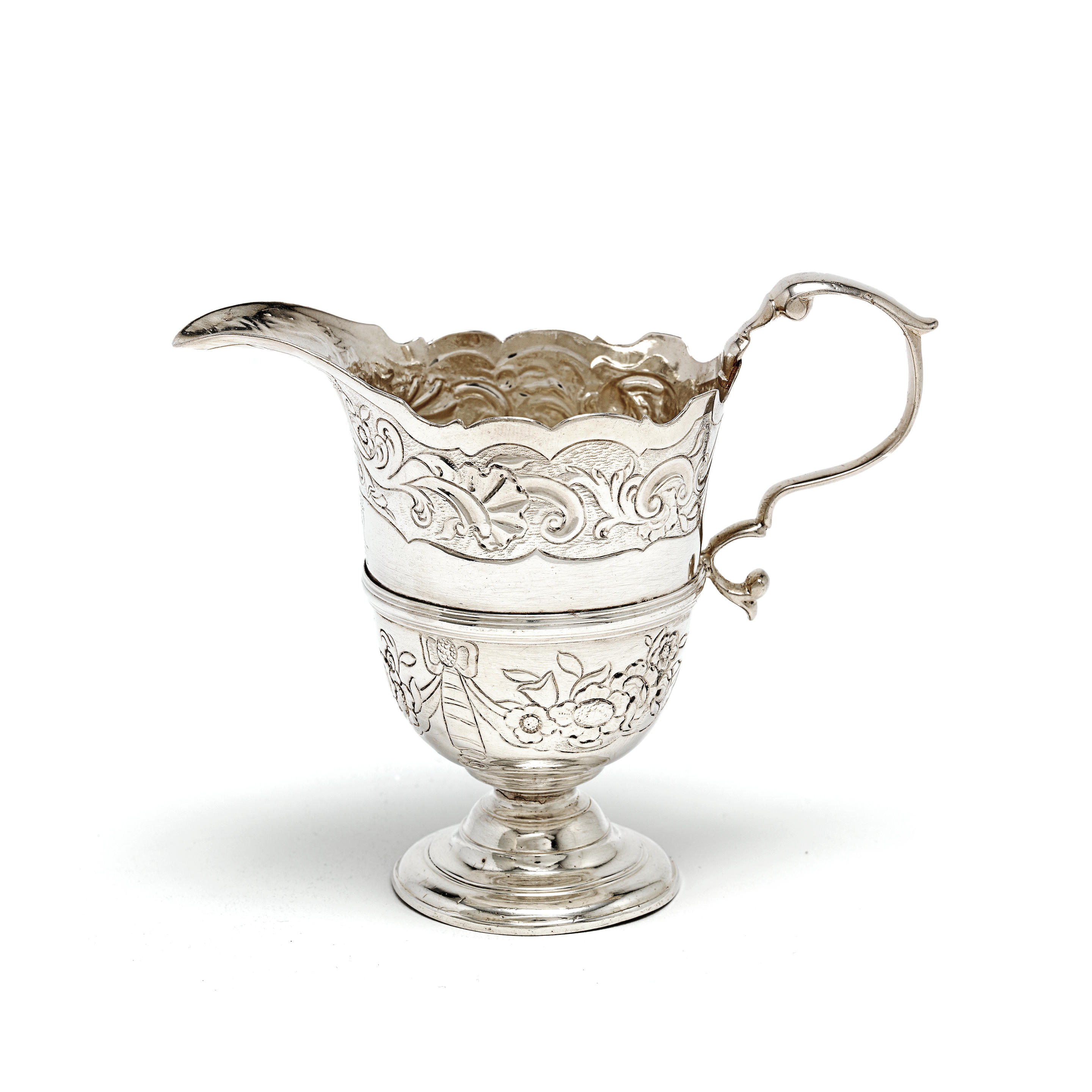 Appraisal: AN TH CENTURY IRISH SILVER CREAM JUG no maker's mark