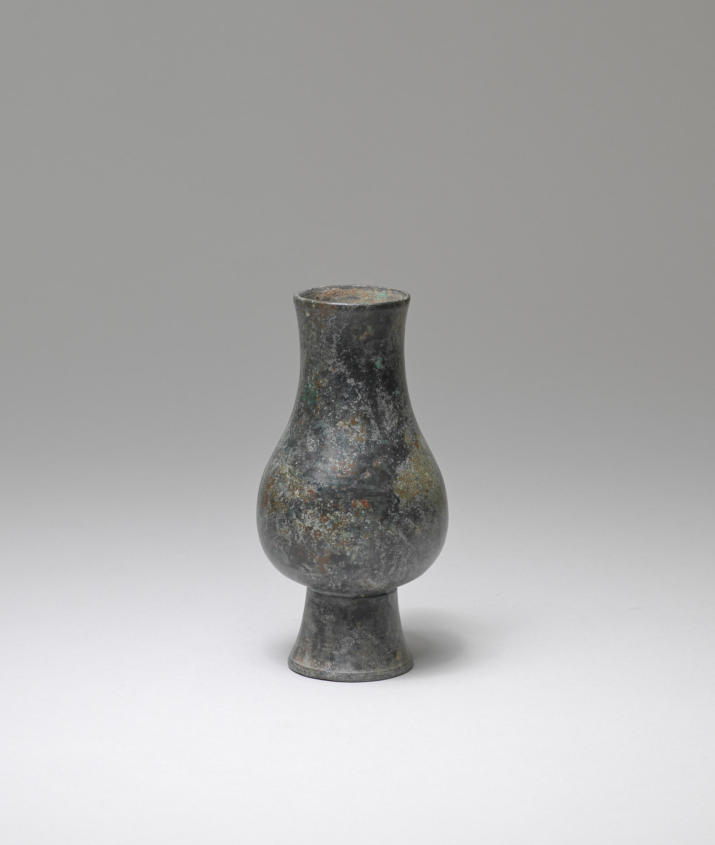 Appraisal: A SMALL BRONZE WINE VESSEL HU th th century Expertly