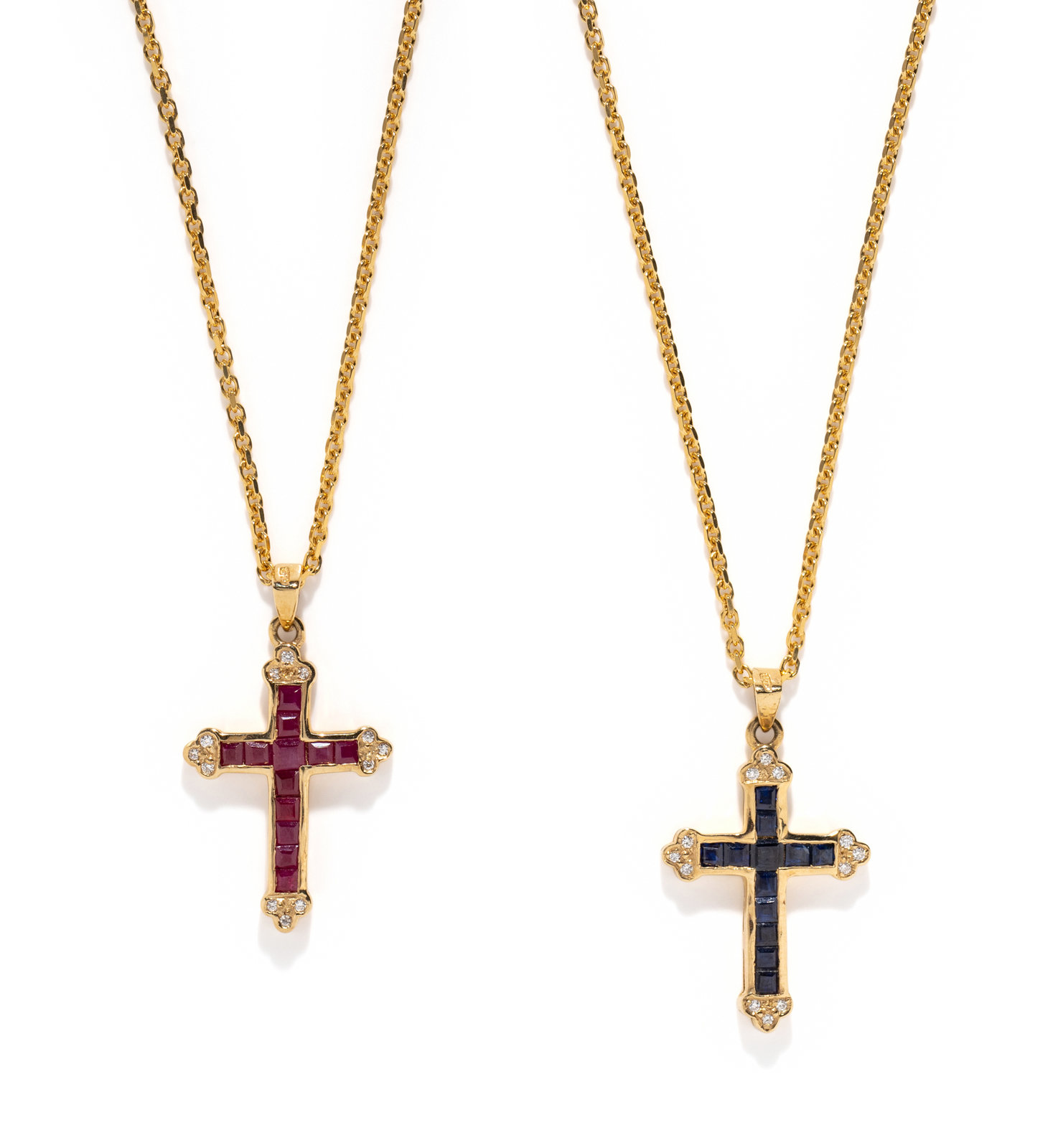 Appraisal: COLLECTION OF DIAMOND AND GEMSTONE CROSS NECKLACES Consisting of two